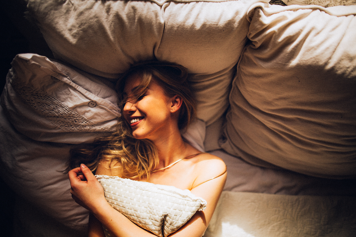 People 1500x1000 women model blonde lying on back no bra in bed closed eyes smiling pillow women indoors hair in face Alicia Schneider Andre Josselin top view happy happiness