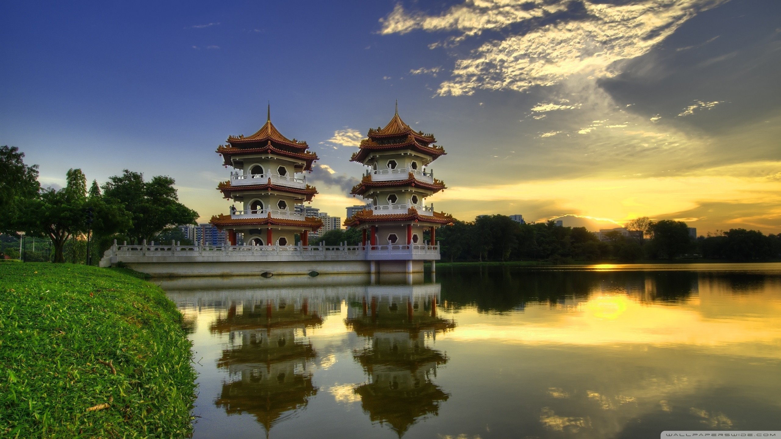 General 2560x1440 architecture trees Asian architecture Singapore pagoda lake grass water reflection clouds Sun