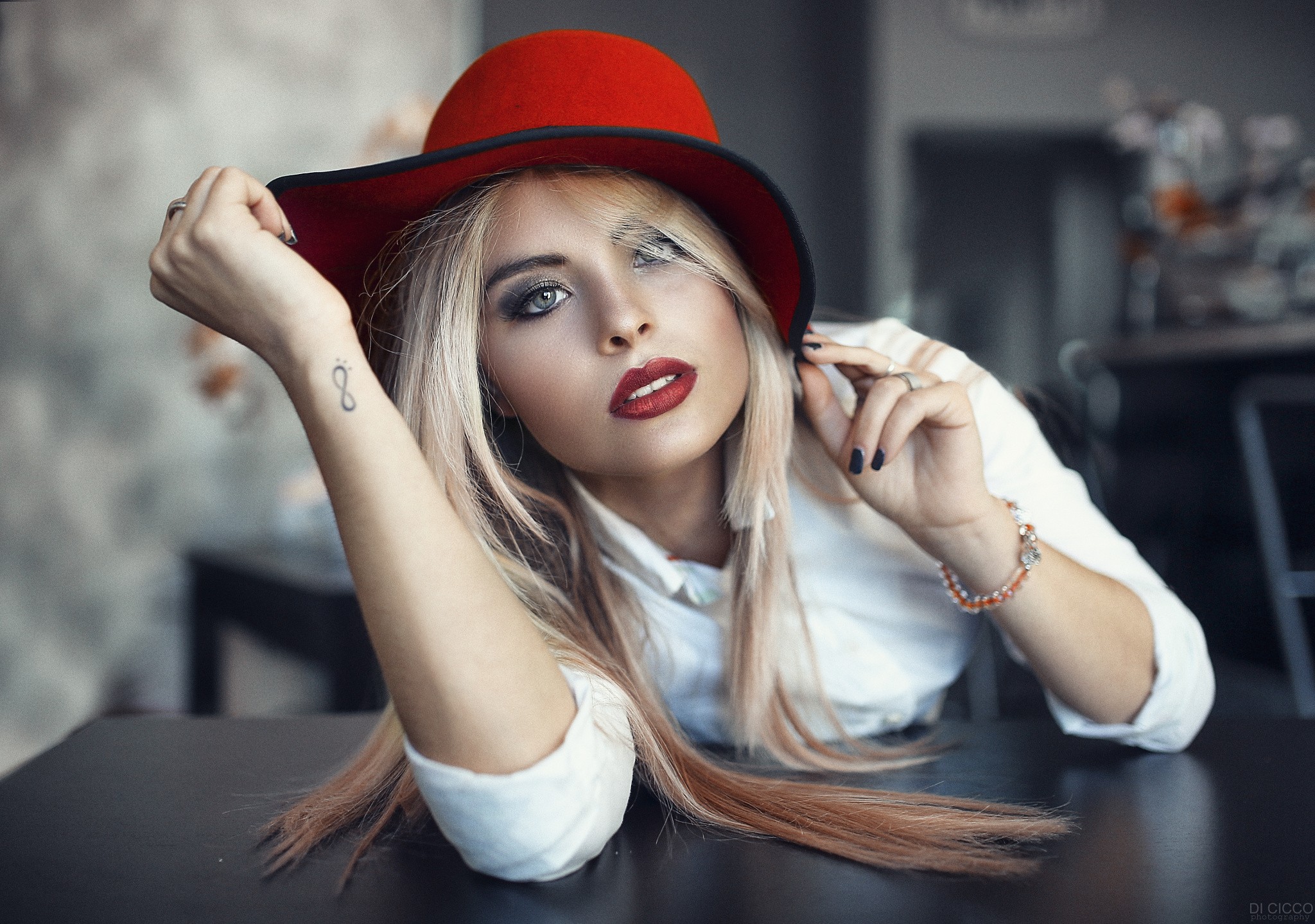 People 2048x1439 women blonde tattoo hat red lipstick portrait Alessandro Di Cicco model face blue eyes smoky eyes white shirt women with hats watermarked women indoors indoors black nails painted nails inked girls long hair closeup eyeliner lipstick April Slough