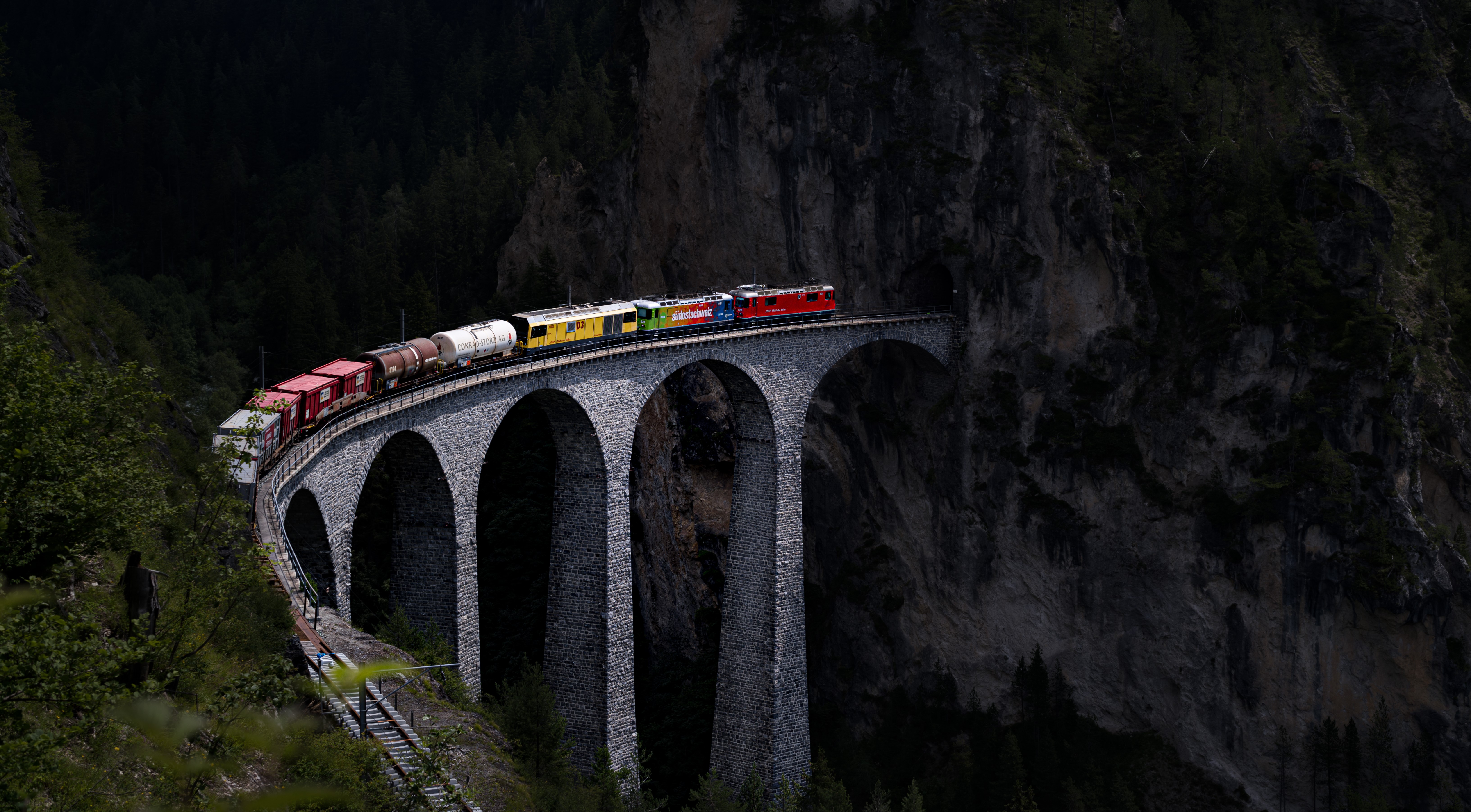 General 6531x3605 landscape mountains trees plants bridge architecture rail railway train locomotive electric locomotives Landwasser Viaduct Switzerland Olivier Muriset scarecrows