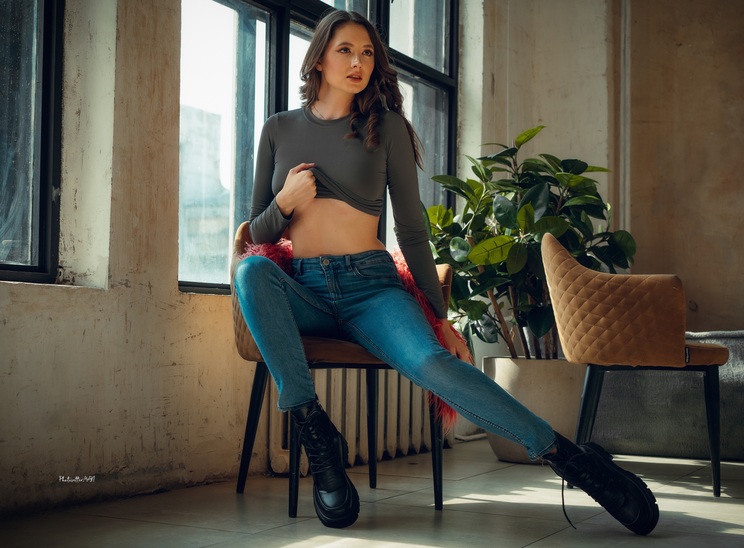 People 2560x1889 Alexander Nikolsky model Disha Shemetova jeans women makeup women indoors boots brunette by the window sitting red lipstick whole body frontal view indoors sitting on chair looking away parted lips spread legs long hair signature leaves grey tops lifting shirt