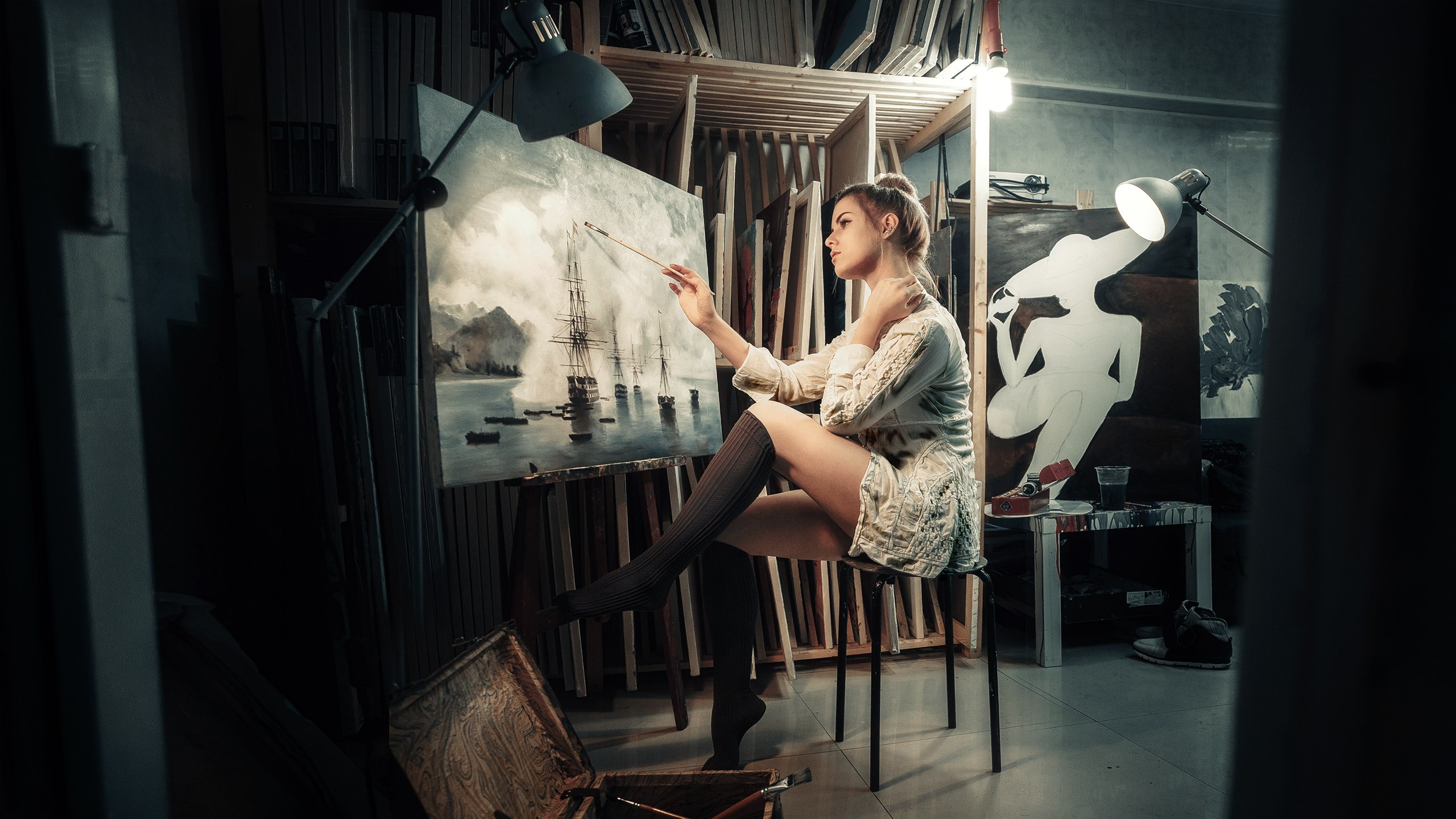 People 2560x1440 painting women model sitting women indoors knee high socks hairbun Delaia Gonzalez pointed toes thighs