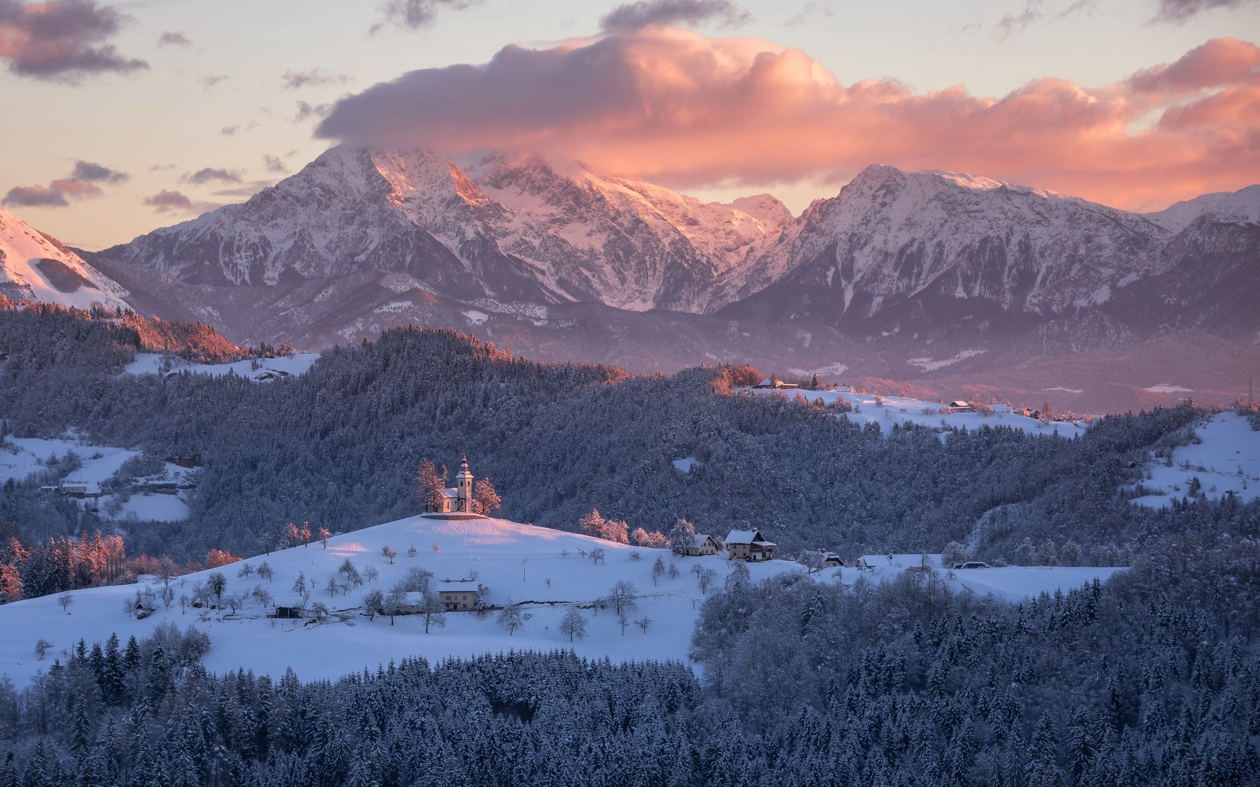 General 2560x1600 forest nature winter hills snow clouds sky landscape building house Slovenia mountains church