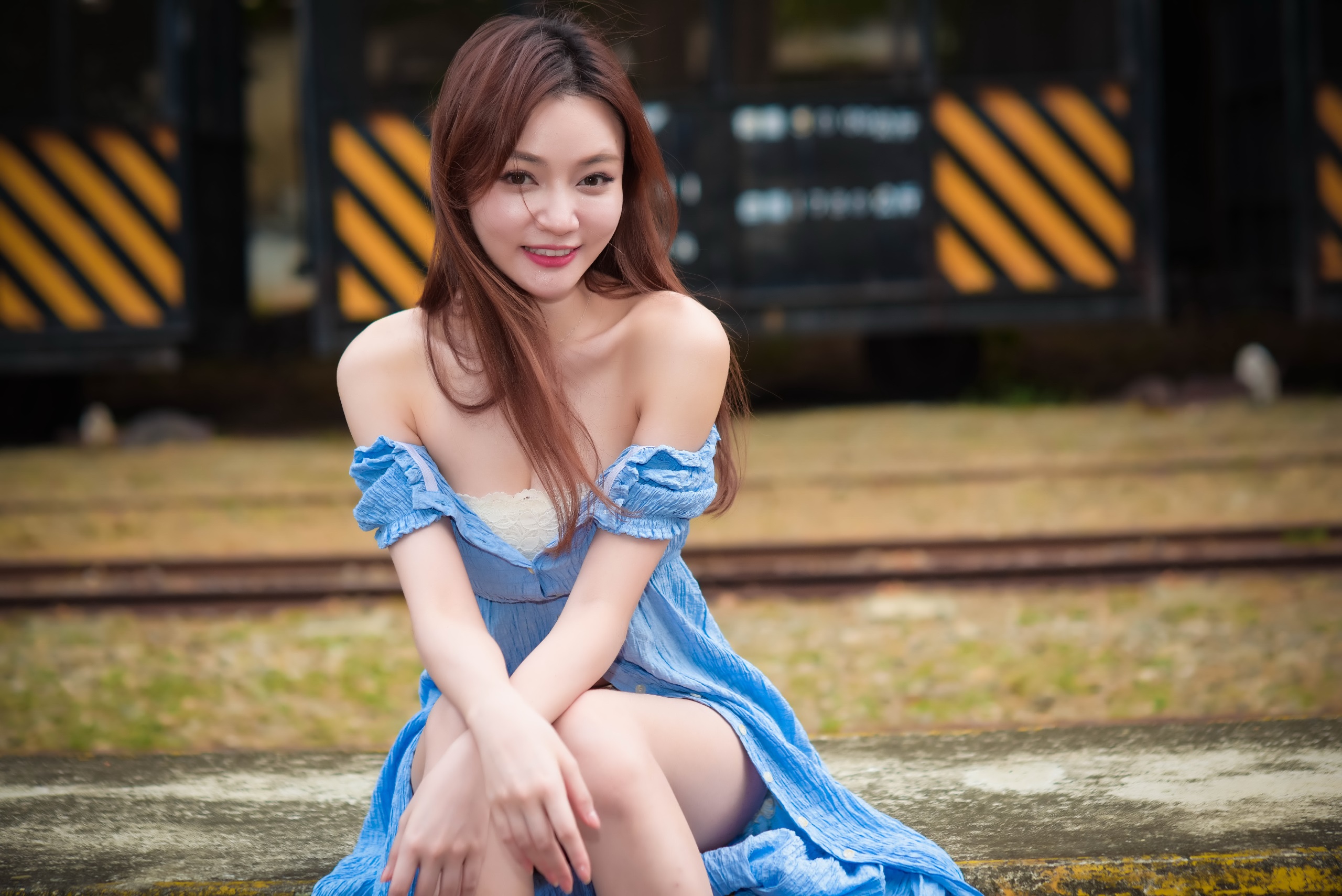 People 2560x1709 Asian women dress blue dress sitting blue clothing smiling red lipstick women outdoors model dyed hair looking at viewer long hair bare shoulders