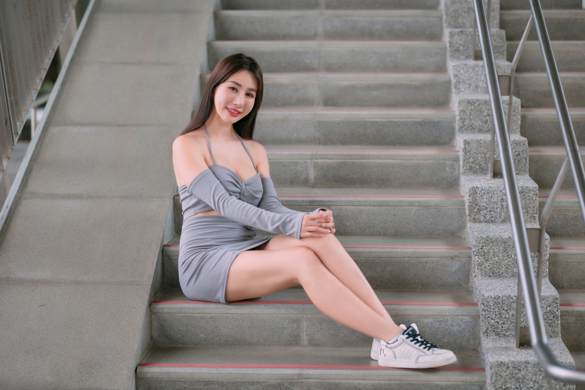 People 1920x1280 Asian model women long hair dark hair sitting stairs sneakers grey skirt grey tops iron railing hands on knees white sneakers legs socks miniskirt skirt bare shoulders cleavage red lipstick smiling looking at viewer pale women outdoors outdoors