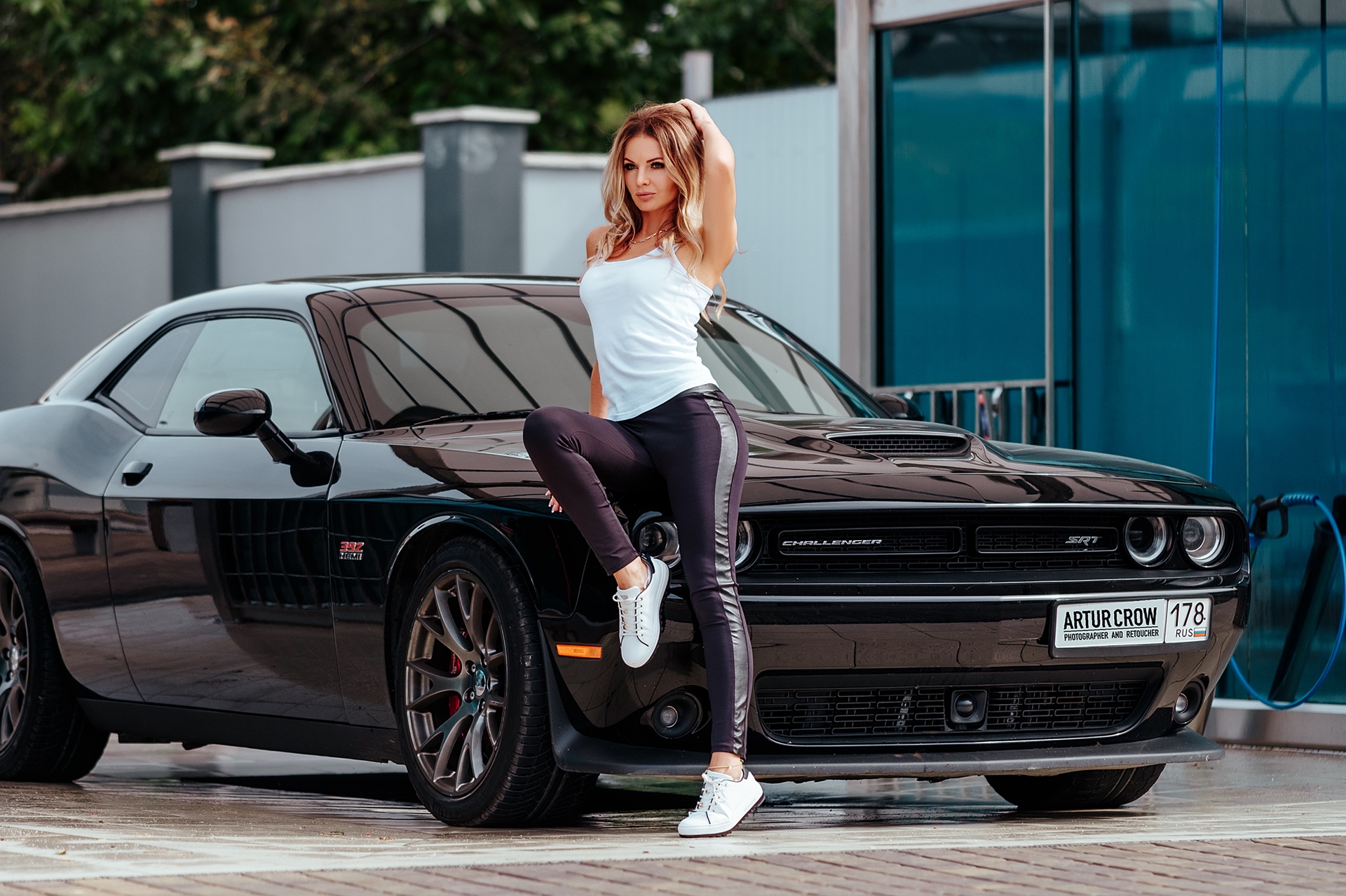People 1920x1279 Artur Crow Dodge Challenger women women outdoors T-shirt sweatpants sneakers white sneakers supercars model blonde black cars street road necklace car Dodge women with cars hand(s) on head sitting armpits muscle cars American cars Stellantis