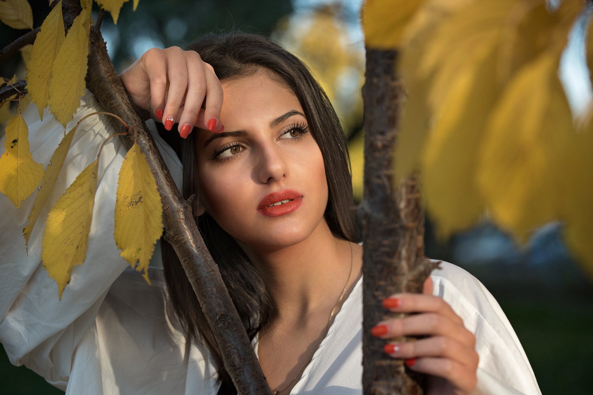 People 2048x1367 model women red lipstick face painted nails leaves women outdoors white shirt red nails brown eyes necklace trees looking away brunette dark hair