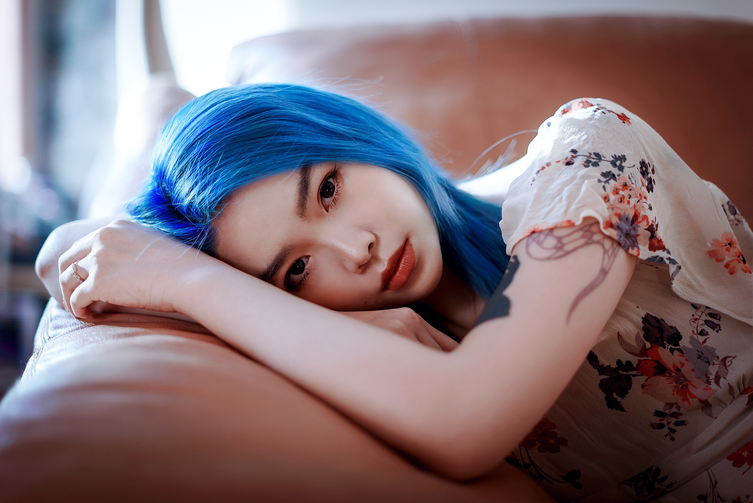 People 2560x1709 women model Asian blue hair dyed hair looking at viewer pierced eyebrow pink lipstick dress lying on side couch depth of field portrait inked girls tattoo indoors women indoors