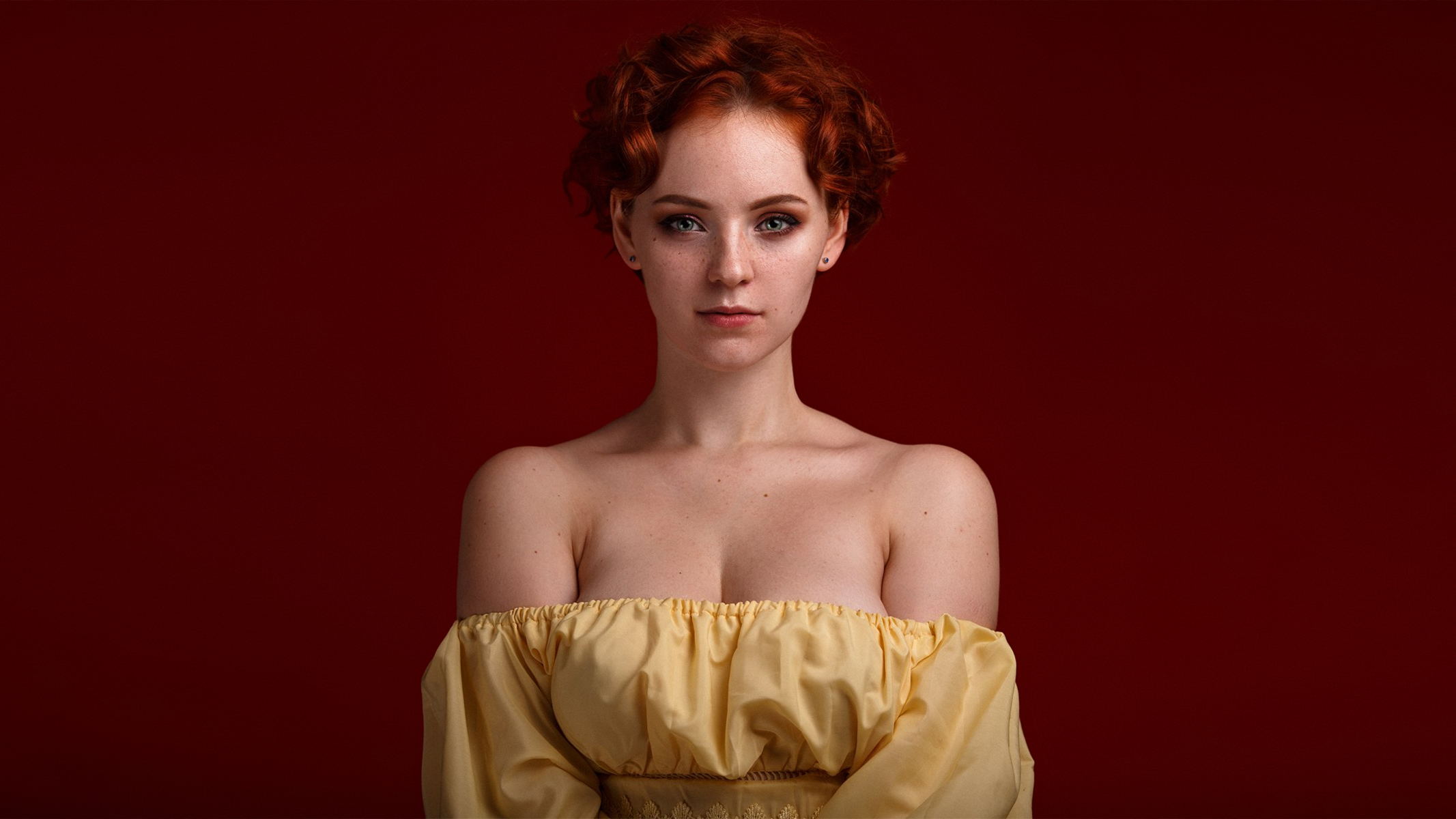 People 2133x1200 women model redhead short hair freckles looking at viewer portrait earring bare shoulders cleavage dress yellow dress red background simple background photography Alexandr Chuprina