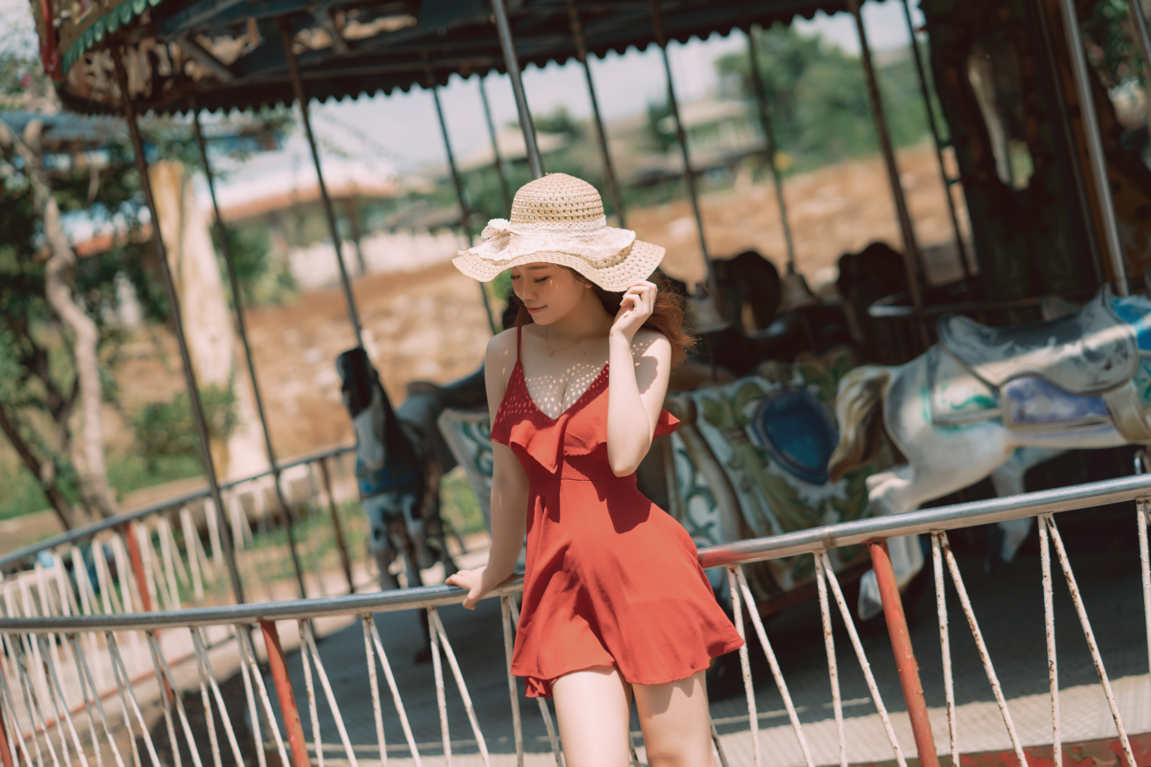 People 3840x2561 Asian women model brunette portrait women with hats hat necklace closed eyes smiling cleavage dress railing carousels outdoors women outdoors