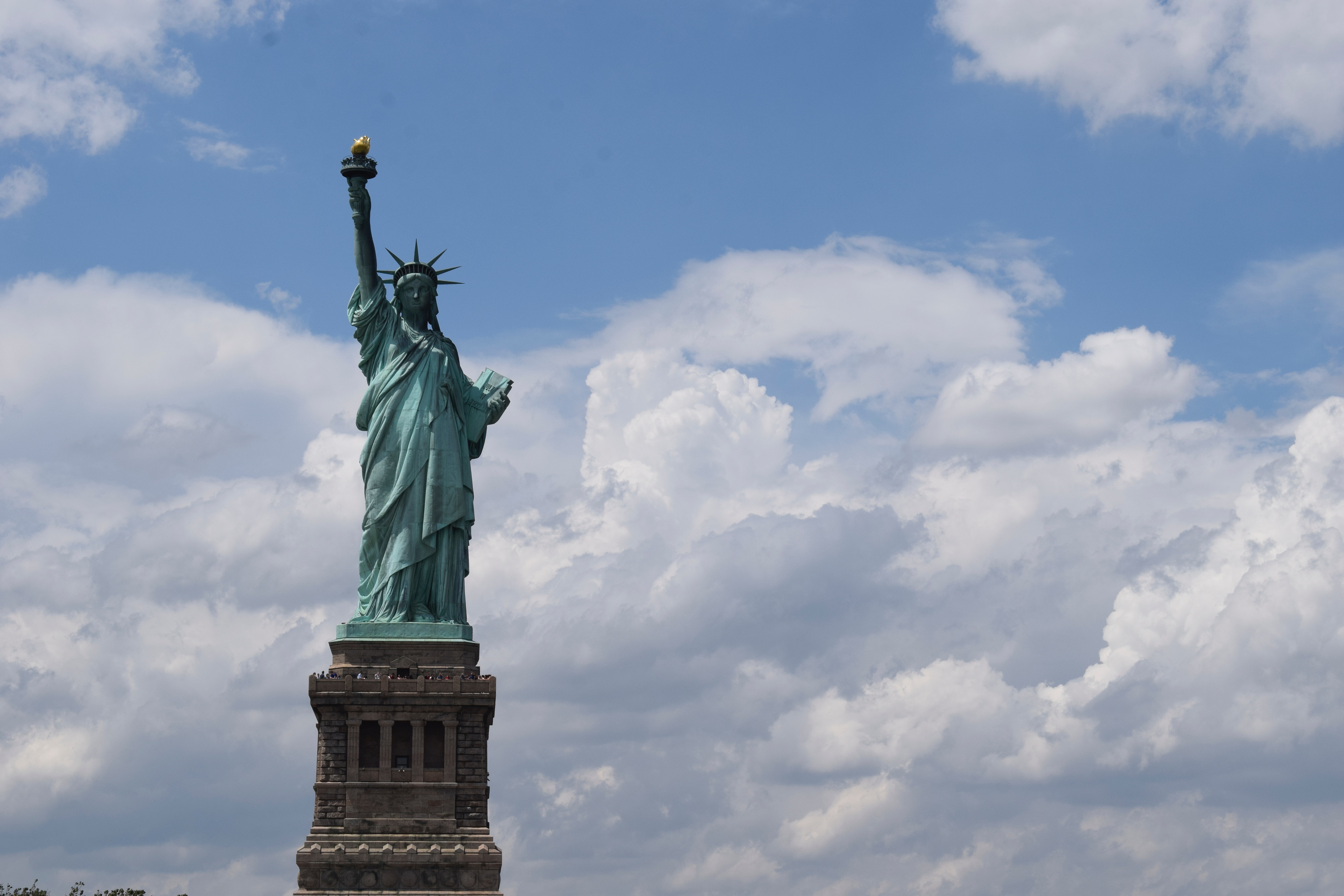 General 6000x4000 monument Statue of Liberty clouds New York City