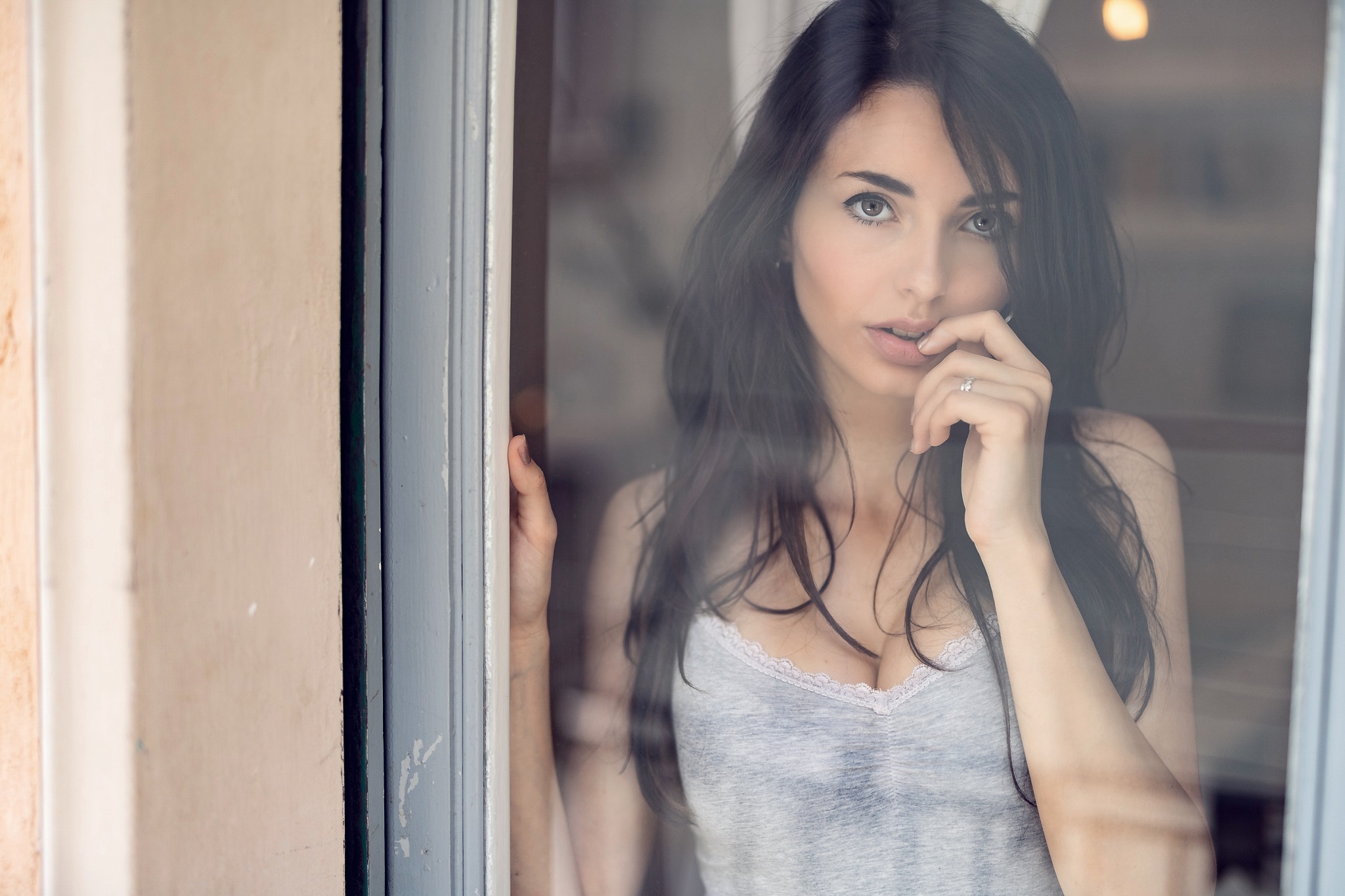 People 2048x1365 Luigi Malanetto women model looking at viewer tank top finger on lips cleavage long hair women indoors looking out window black hair dark hair Nicole Pasquale by the window one arm up