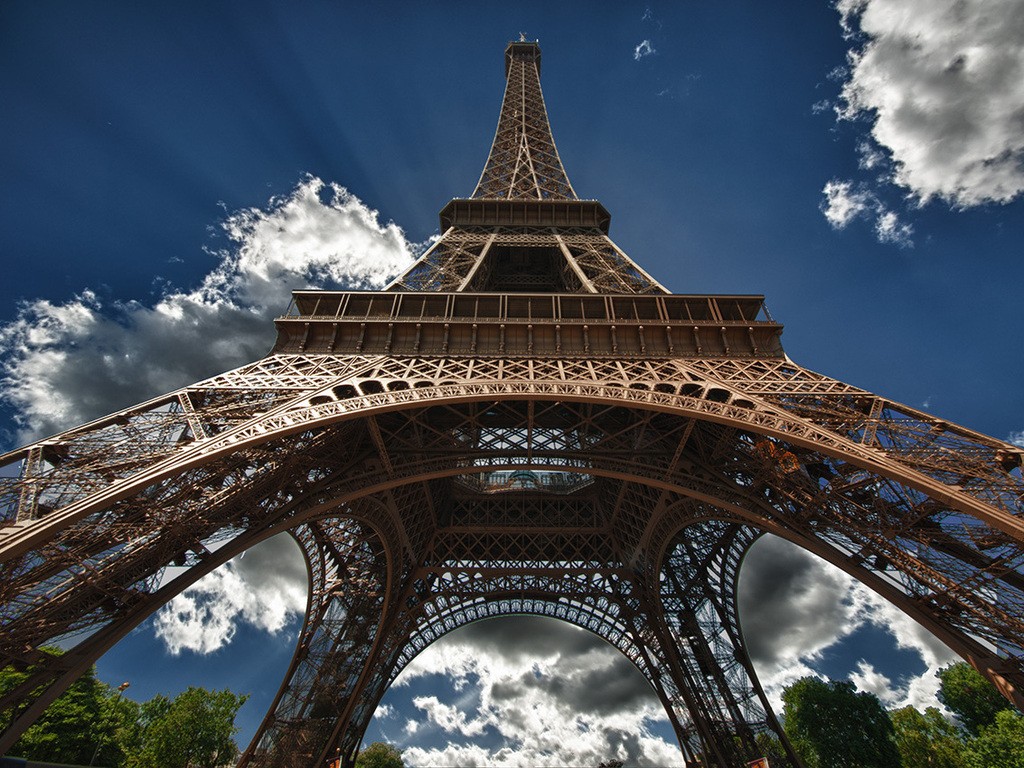 General 1024x768 Paris Eiffel Tower bottom view clouds landmark Europe