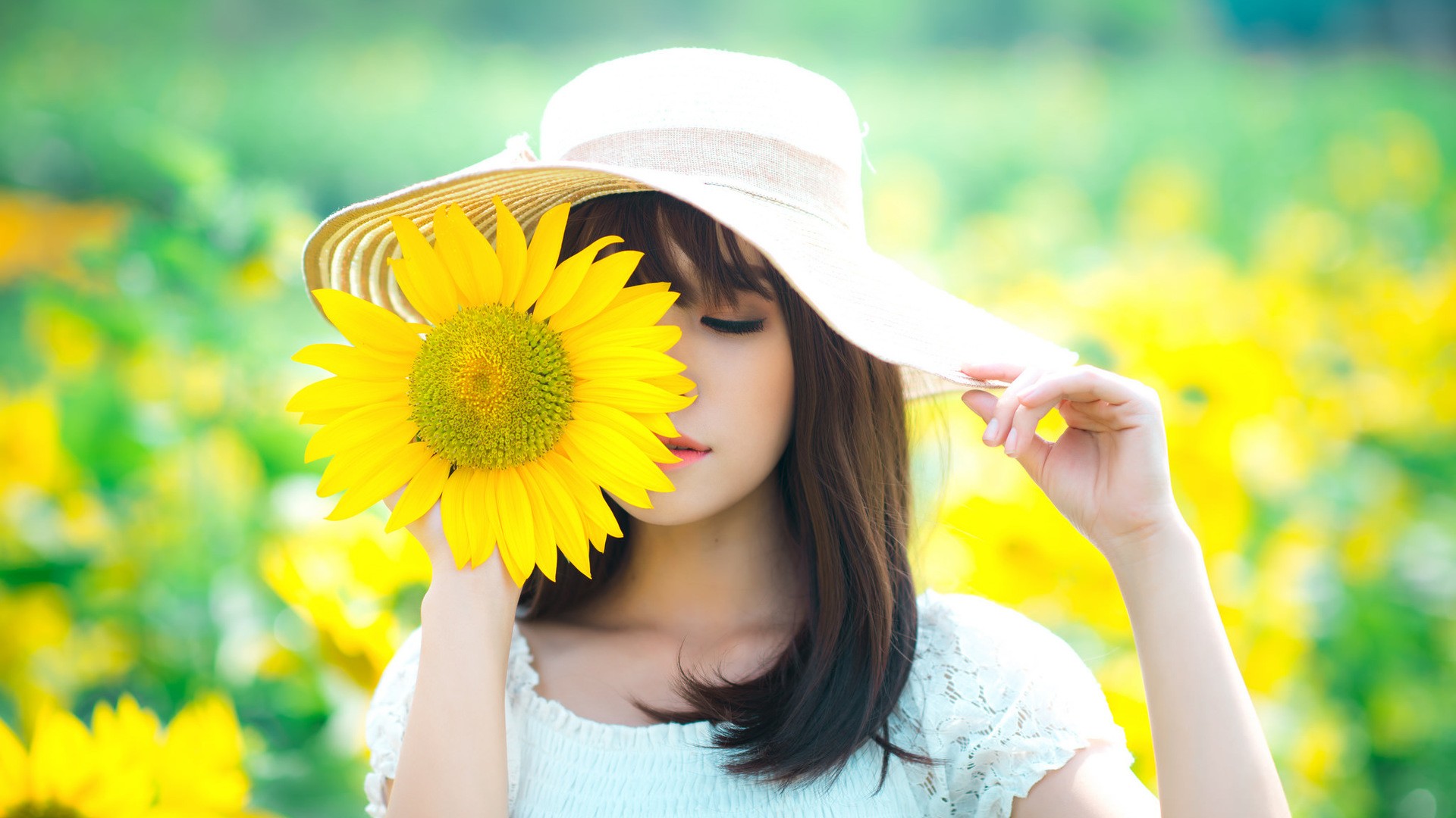 People 1920x1080 women model brunette long hair women outdoors depth of field Asian nature flowers sunflowers yellow flowers hat closed eyes white tops face millinery plants white clothing pale makeup women with hats