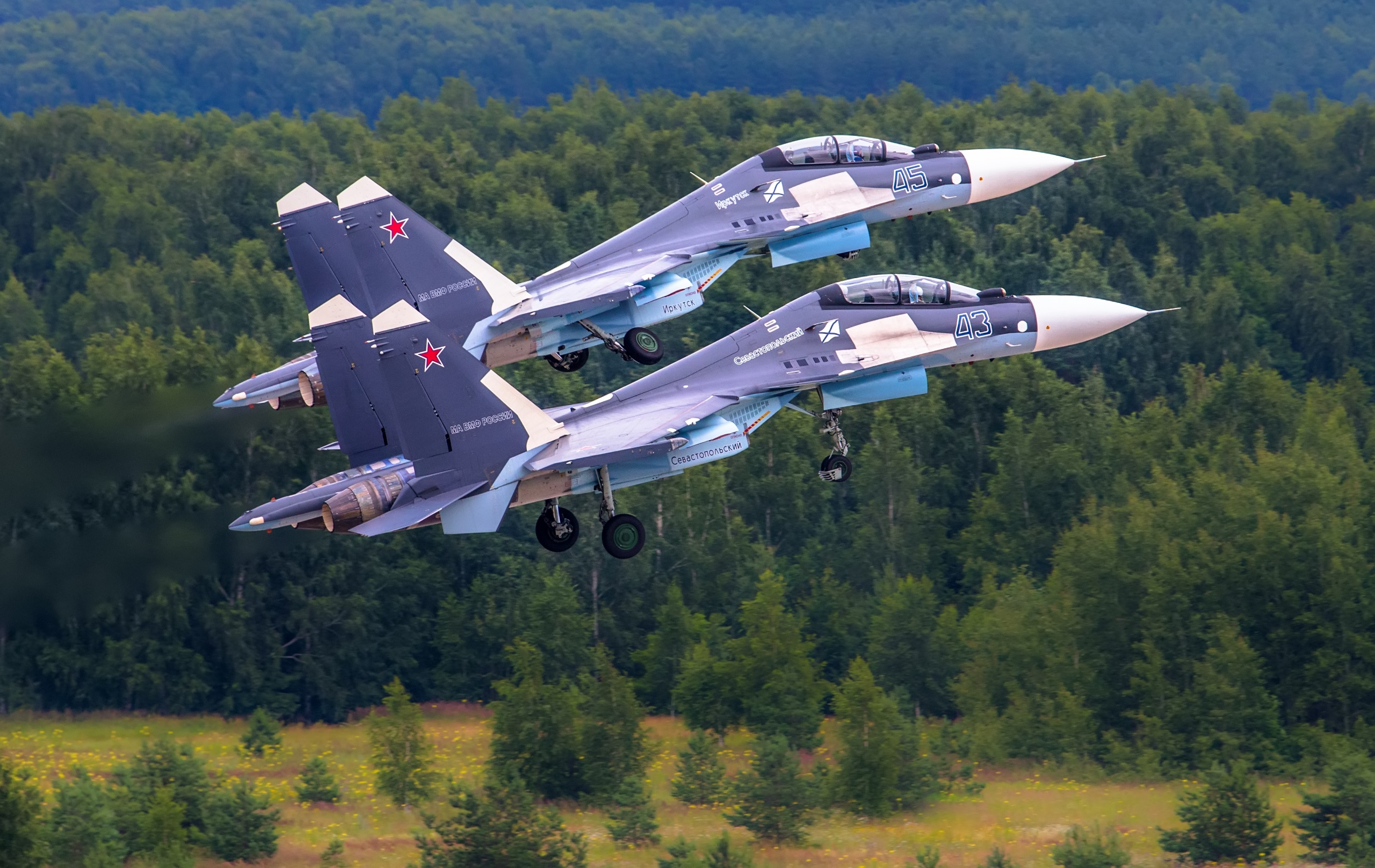 General 2560x1617 purple trees aircraft military military aircraft vehicle Russian Air Force jet fighter Formation take-off Russian/Soviet aircraft Sukhoi Sukhoi Su-30