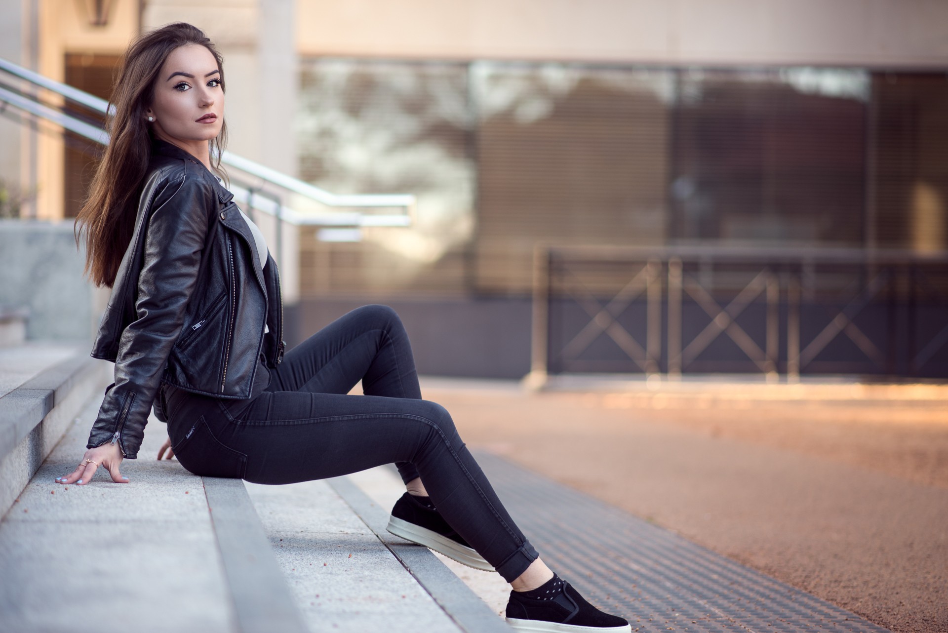 People 1920x1282 women model long hair looking at viewer legs jeans leather jacket brunette sitting black jackets jacket black pants open jacket stairs black clothing closed mouth pearl earrings arm support tight clothing women outdoors urban tight pants