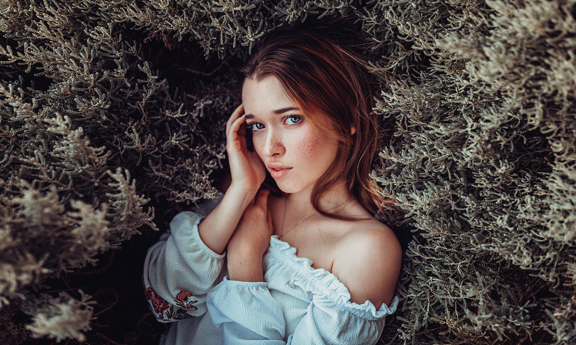 People 2000x1196 women brunette women outdoors freckles bare shoulders portrait white shirt blue eyes face no bra trees Jose Bruzos looking at viewer