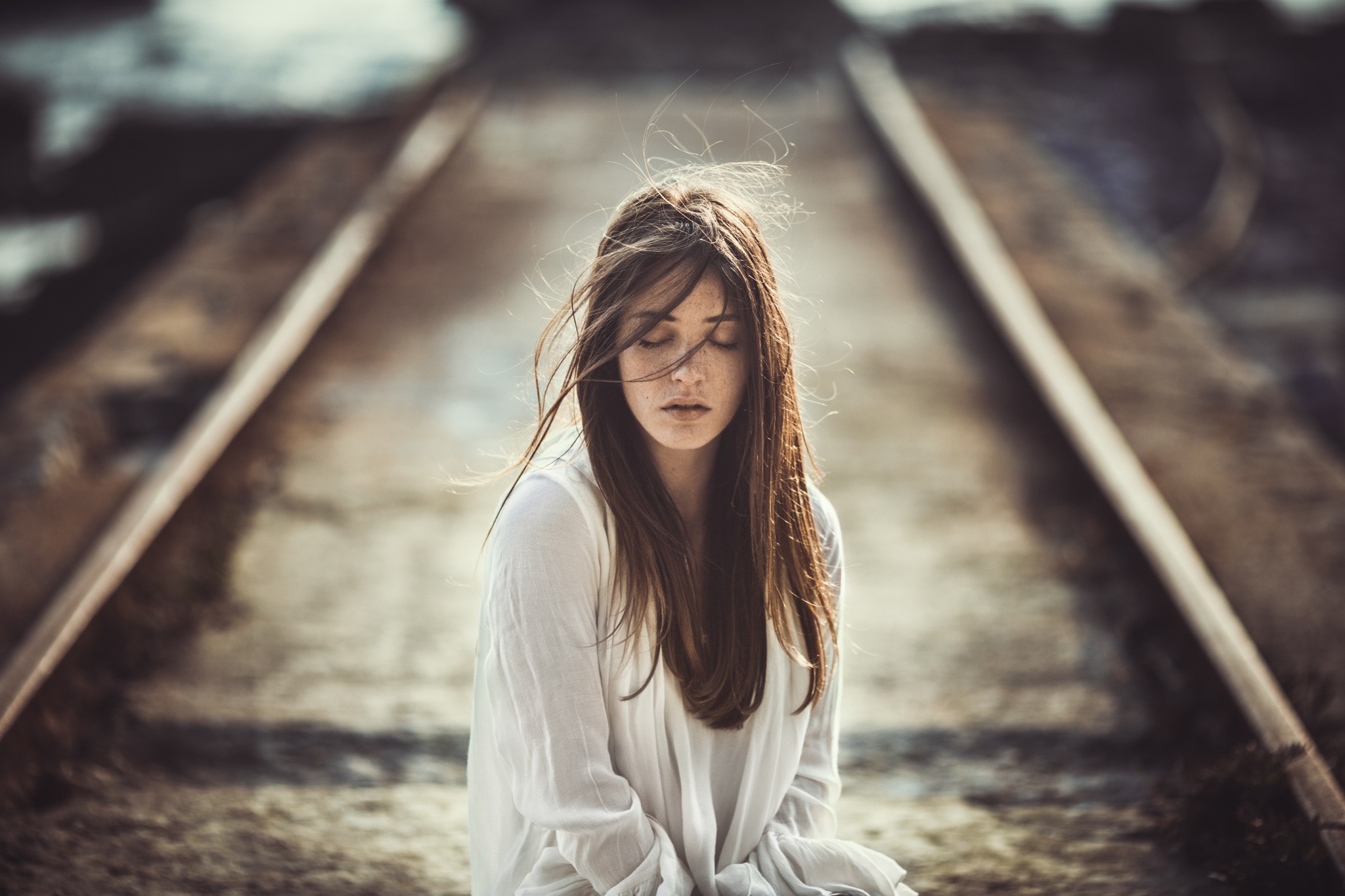 People 2048x1365 women brunette closed eyes face white clothing portrait freckles railway depth of field windy women outdoors emotion long hair hair in face Samuel Bouget