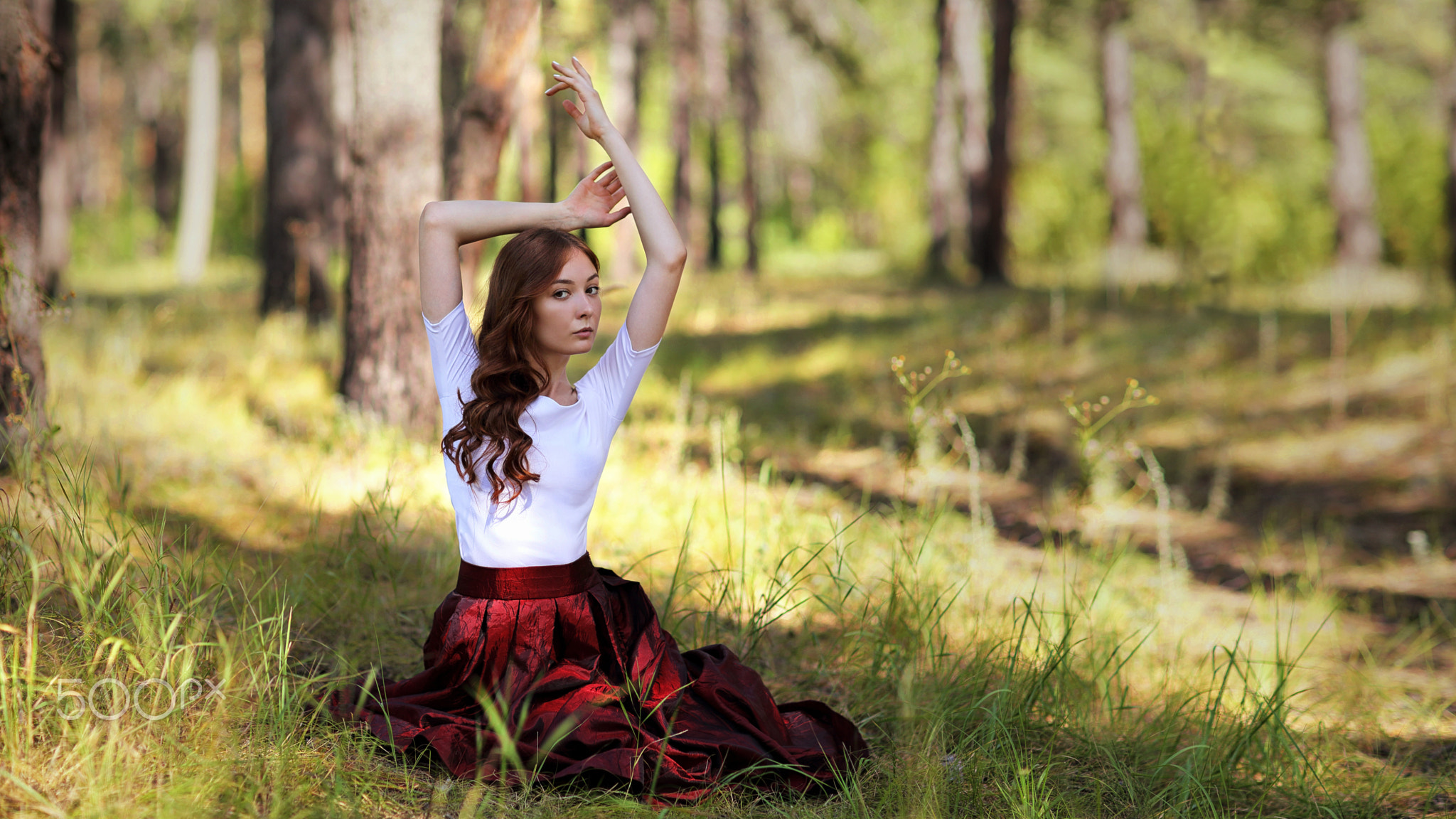People 2048x1152 women redhead white shirt red skirt brown eyes arms up sitting forest looking at viewer Murat Kuzhakhmetov 500px plants grass nature trees women outdoors outdoors
