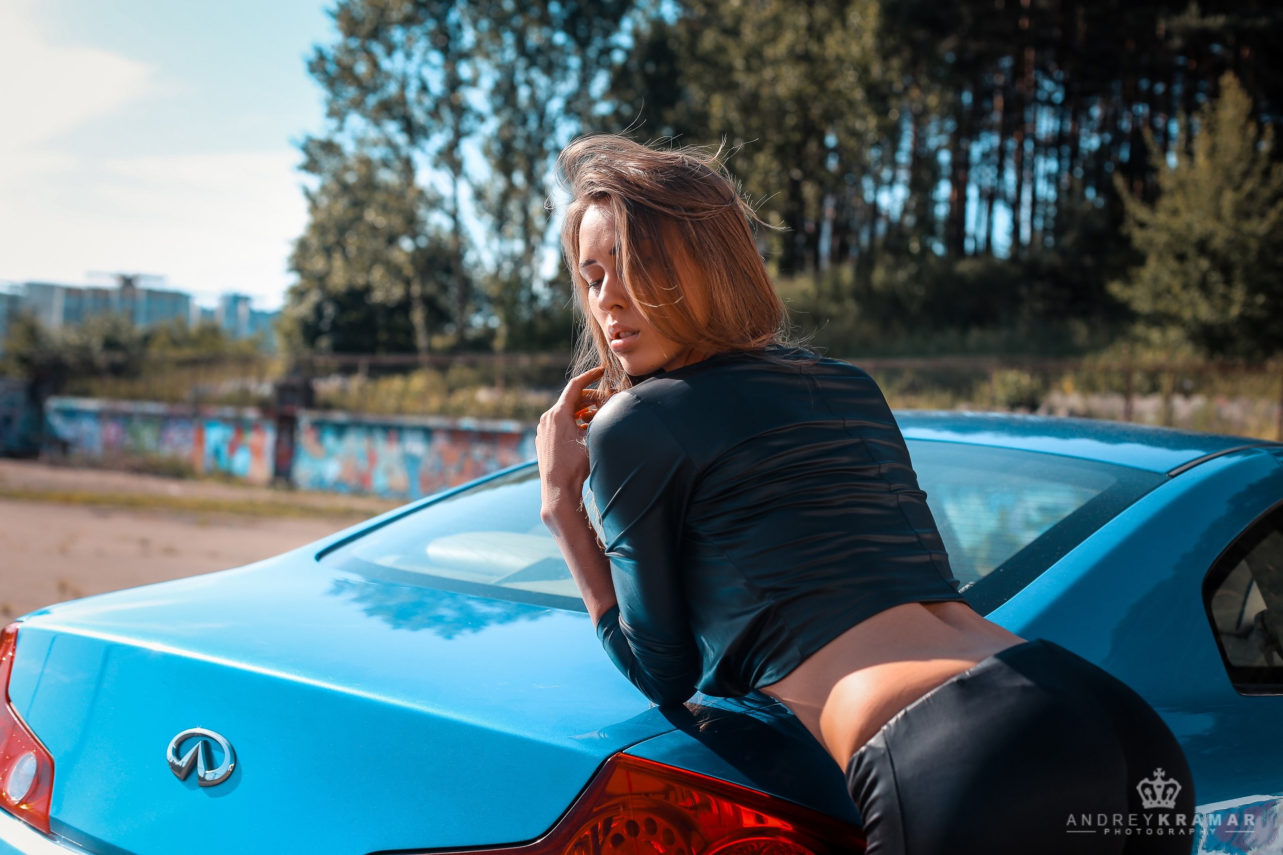People 2560x1707 women model black clothing ass car brunette leather leggings skinny Anna-Maria Eglit Andrey Kramar women with cars blue cars vehicle women outdoors watermarked hair over one eye bent over leather pants  Infiniti Japanese cars Infiniti G35