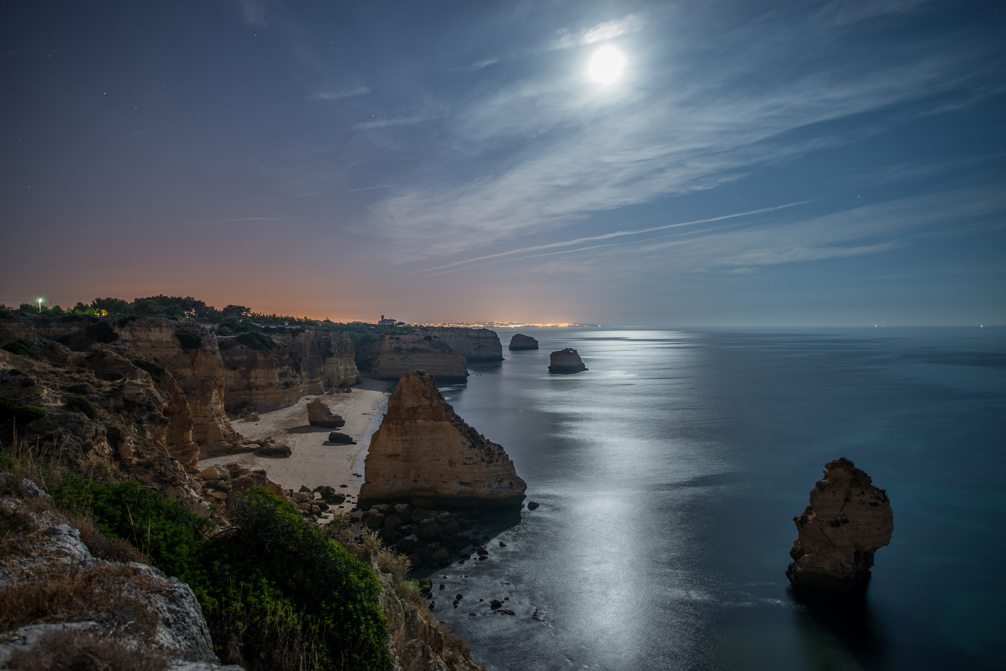 General 2048x1367 night sea Moon moonlight reflection rocks shore Praia da Marinha Portugal full moon