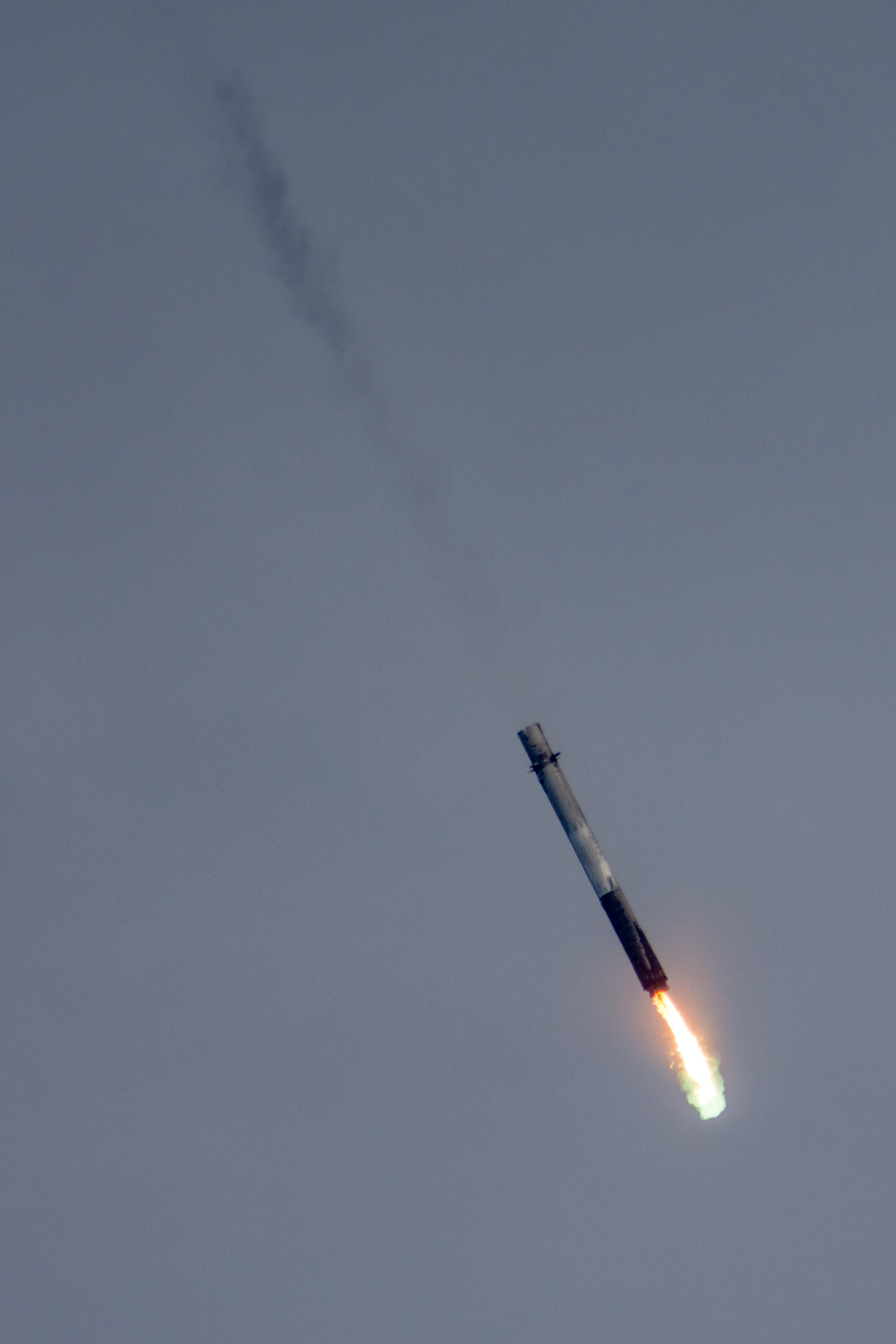 General 2000x3000 SpaceX rocket fire simple background