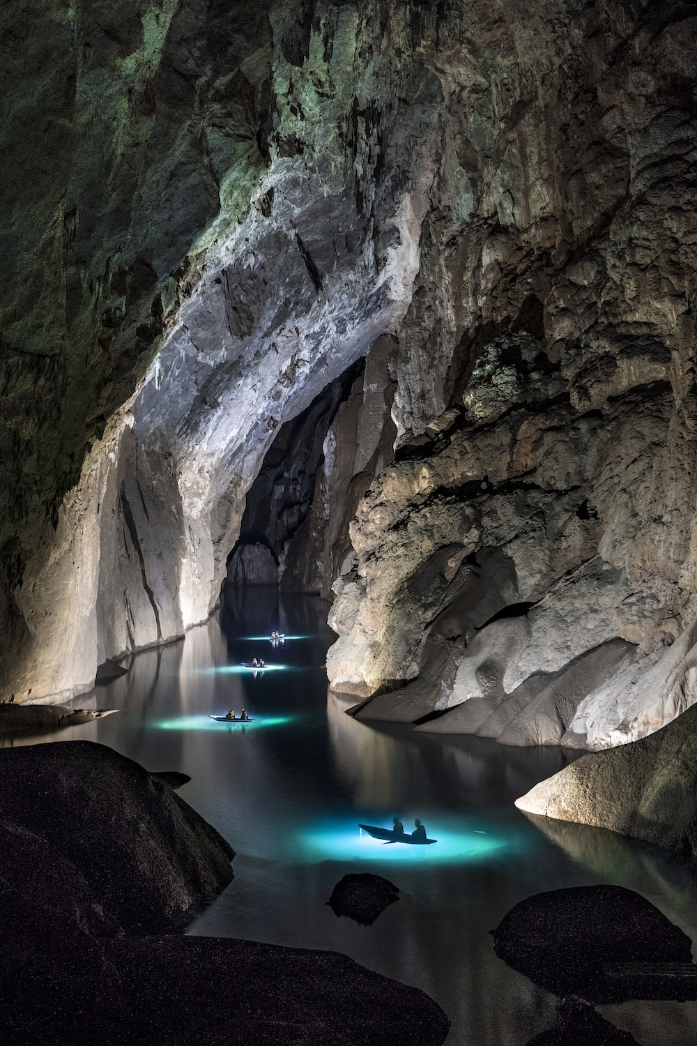 General 1000x1500 nature cave rocks Hang Son Doong Asia Vietnam water portrait display lights boat people stones river reflection