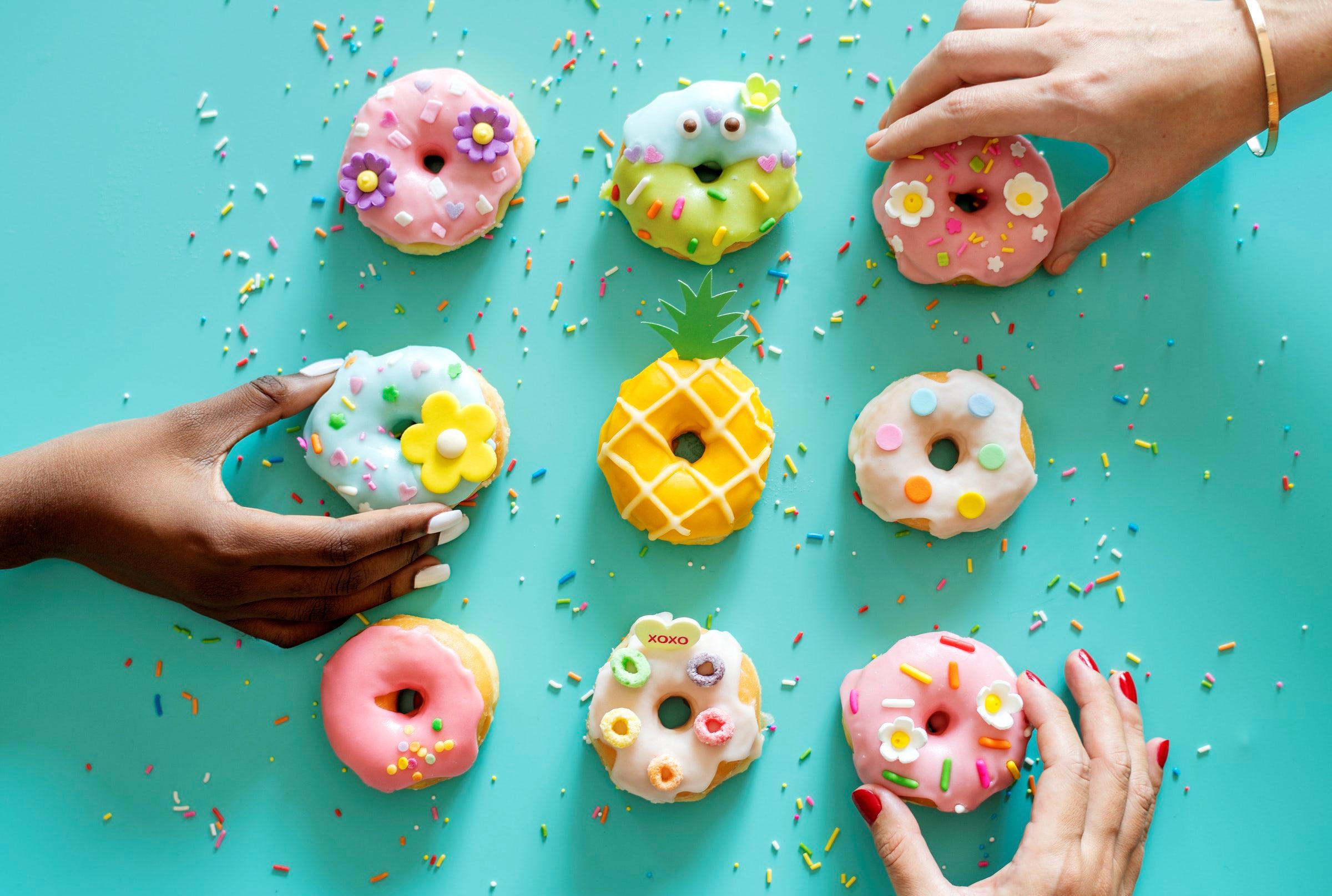 General 2400x1615 hands food sweets donut closeup simple background