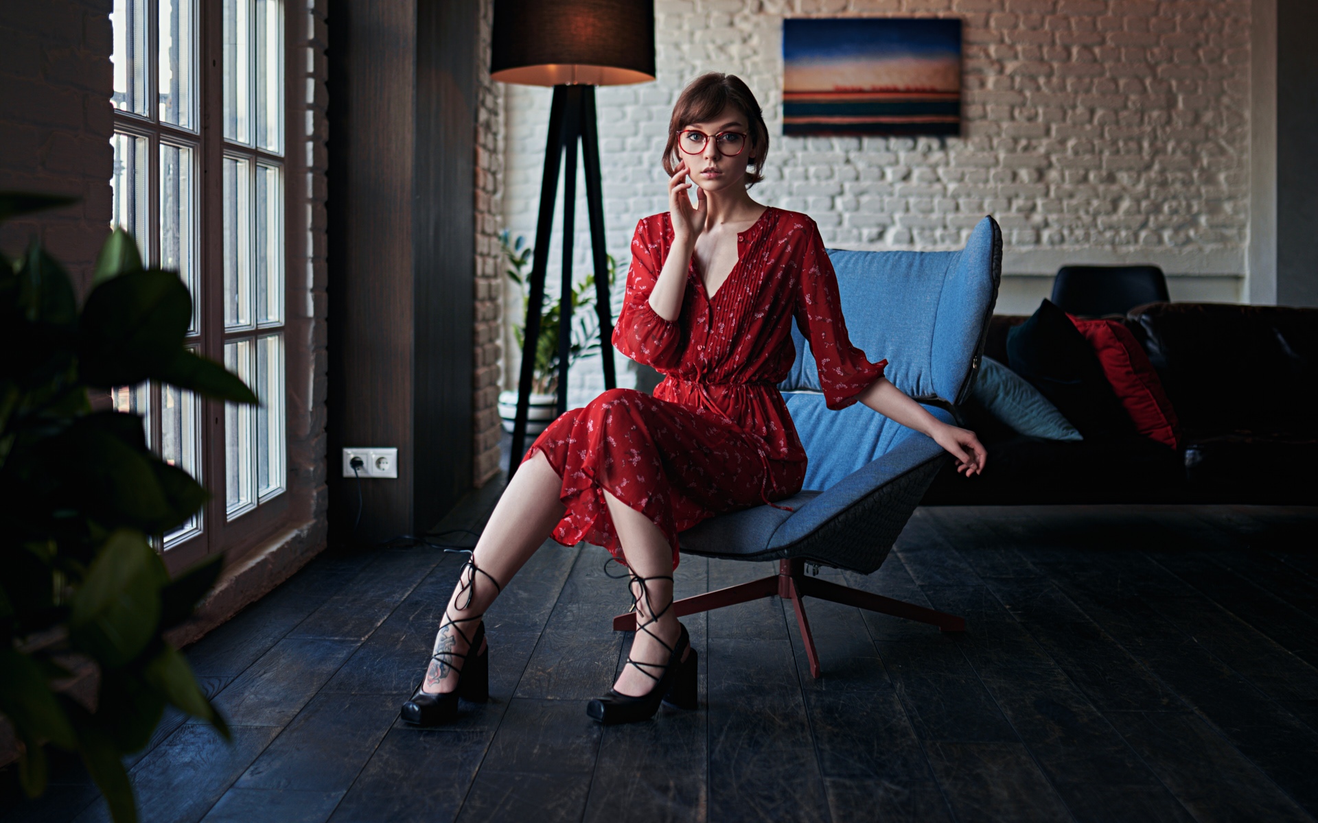 People 1920x1200 Olya Pushkina women model brunette looking at viewer women with glasses glasses indoors dress red dress heels sitting chair couch lamp window tattoo bokeh wall picture frames portrait women indoors Sergey Zhirnov
