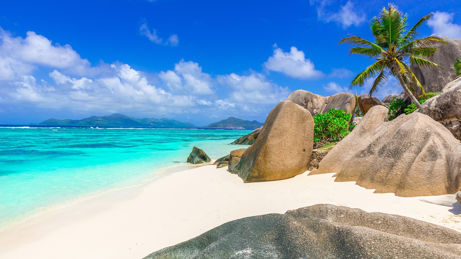 General 1920x1080 nature landscape mountains clouds sky beach rocks sand water clear water trees Seychelles
