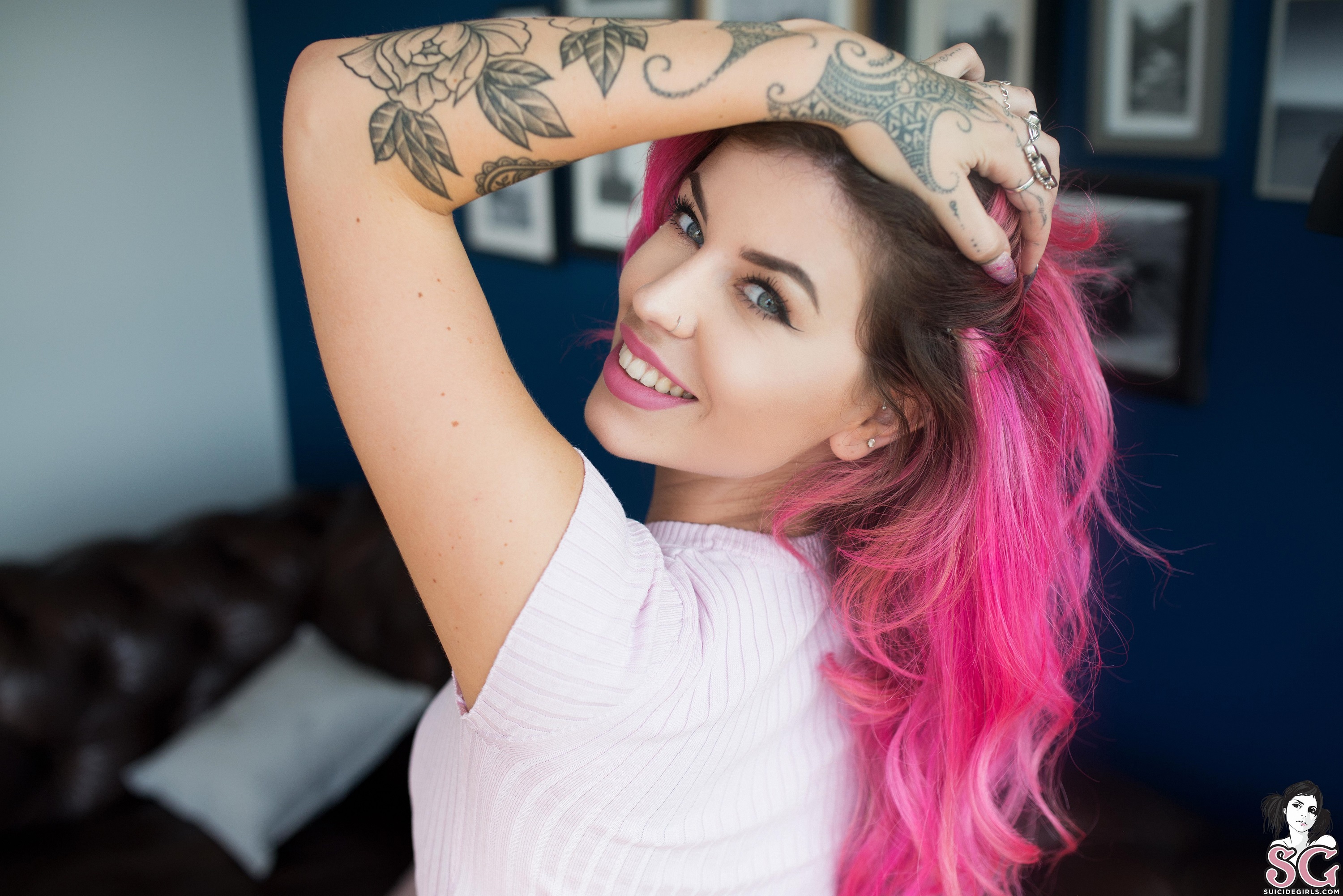 People 3000x2002 Aemelia Suicide women model dyed hair pink hair looking at viewer pink lipstick nose ring smiling portrait hands on head earring face depth of field painted nails tattoo inked girls picture frames couch cushions indoors women indoors Suicide Girls watermarked