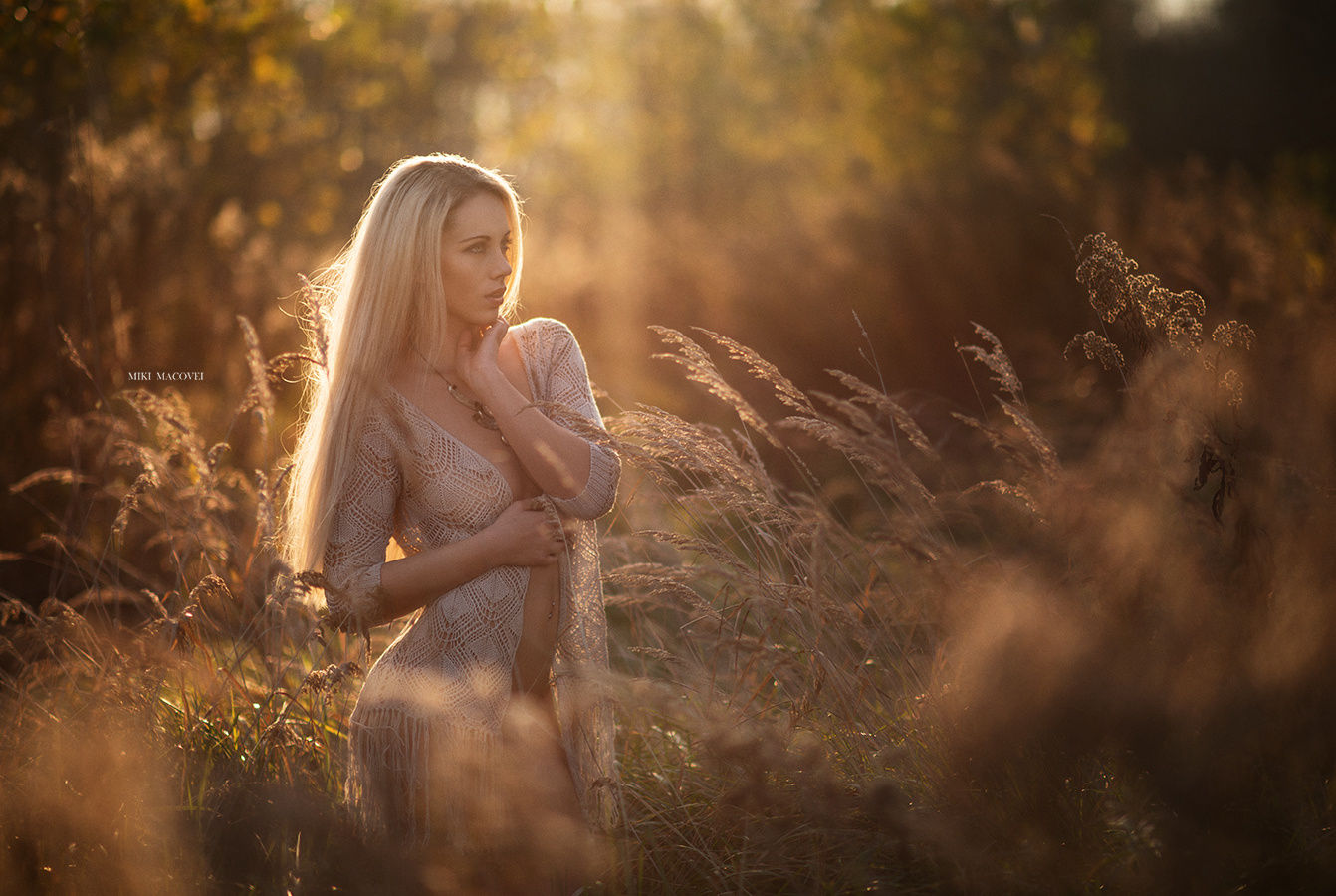 People 1342x900 Miki Macovei women blonde long hair straight hair necklace sweater open clothes see-through clothing white clothing grass nature looking away pierced navel Anna Scheiber