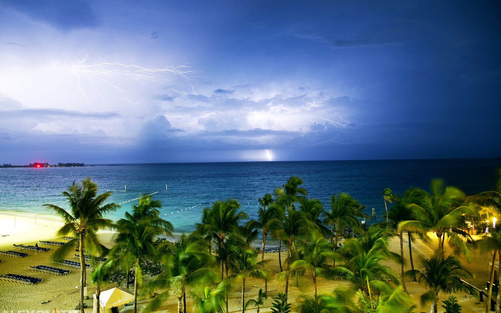 General 1920x1200 clouds lightning storm horizon Bahamas tropical palm trees sea beach windy sand long exposure deck chairs sky