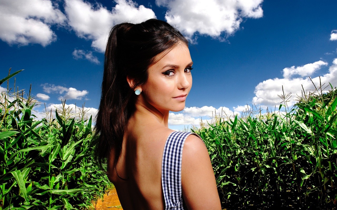 People 1280x800 Nina Dobrev women actress brunette ponytail back looking back long hair looking at viewer plants