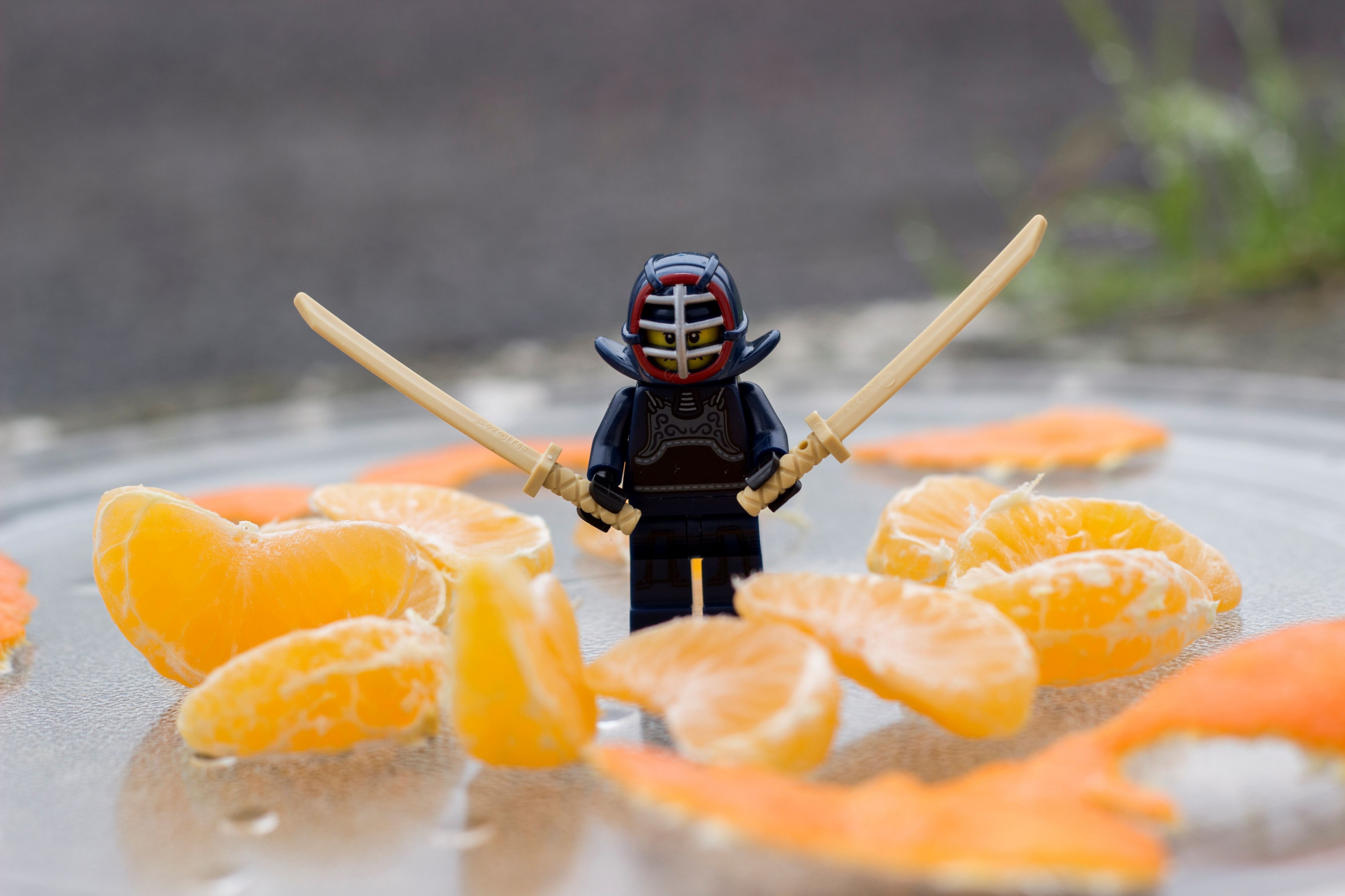 General 5120x3413 LEGO toys closeup miniatures humor photography depth of field ninjas katana fruit tangerine glass figurines
