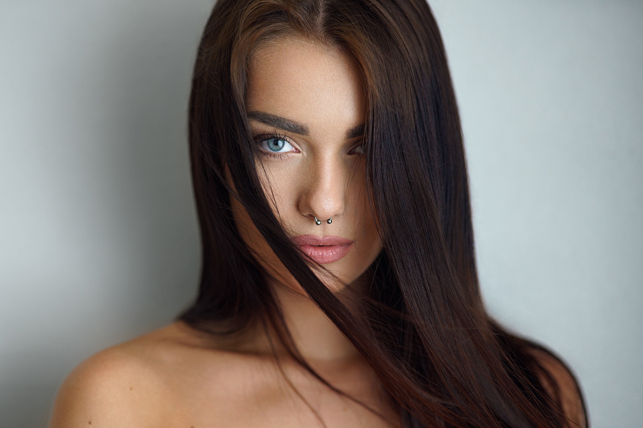 People 2048x1365 women pierced nose blue eyes bare shoulders face simple background portrait brunette hair in face piercing closeup women indoors indoors gray background model long hair Milan R