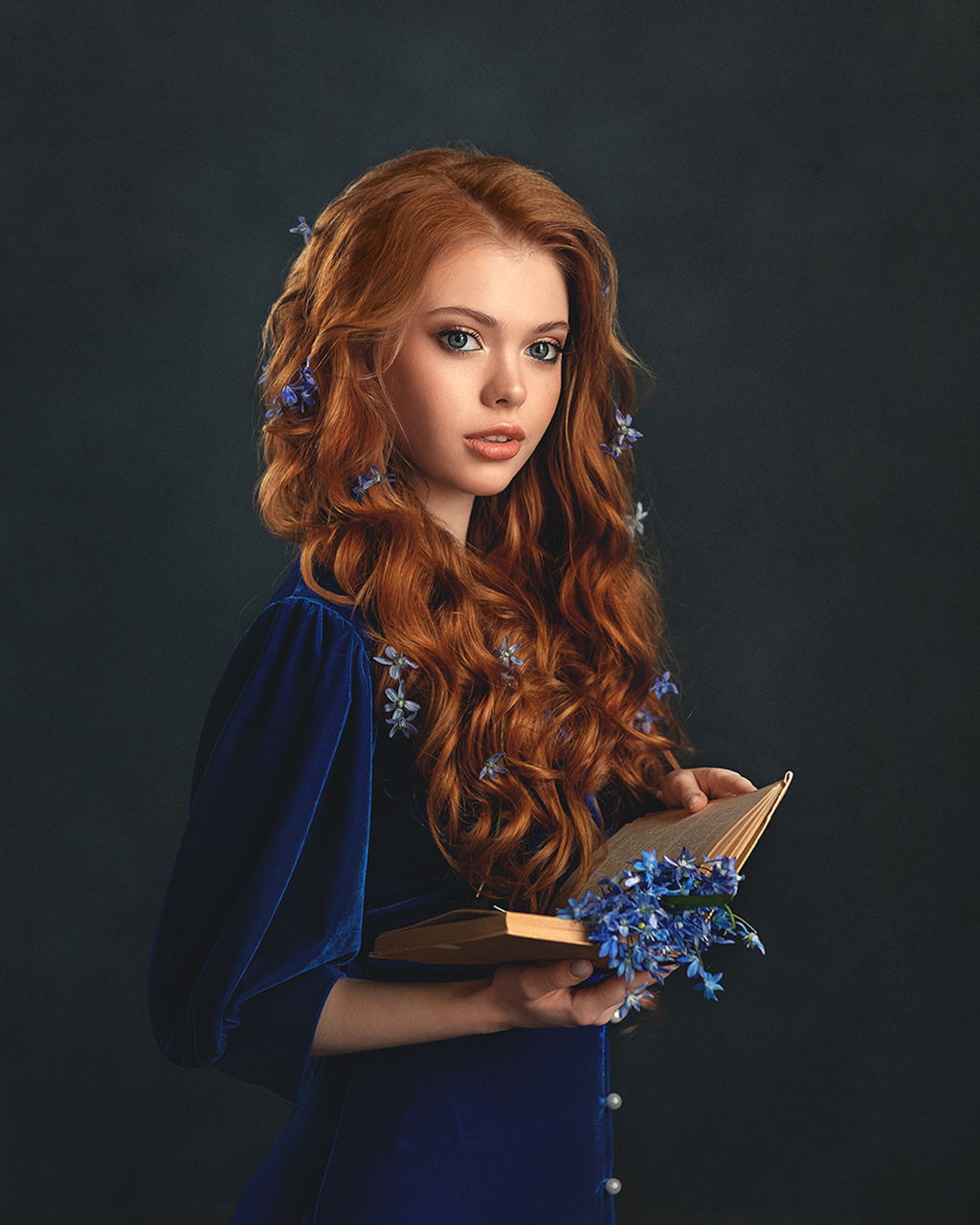 People 1024x1280 Elena Mikhailova women redhead looking away books blue flowers blue clothing flower in hair wavy hair makeup glamour portrait simple background