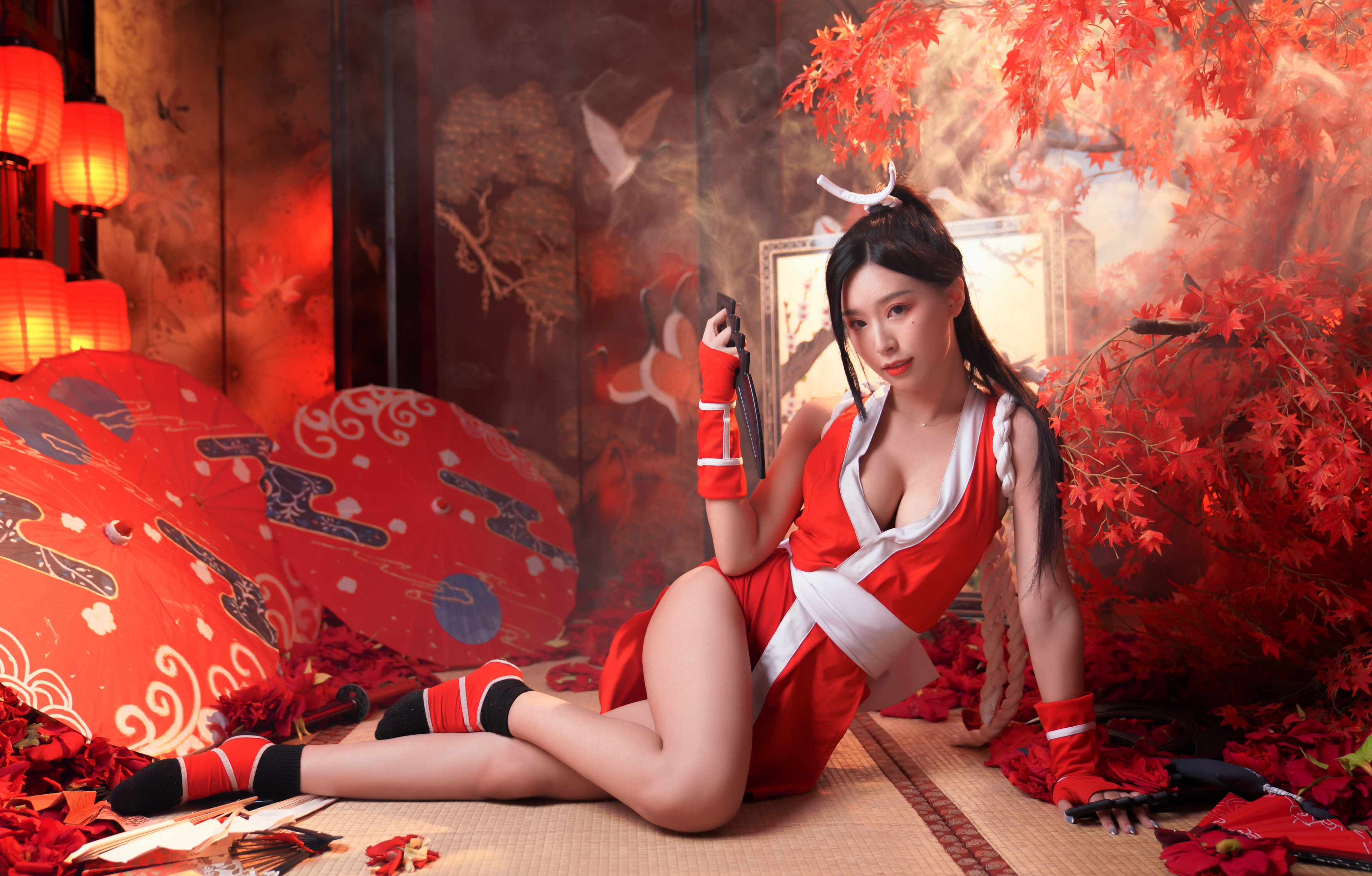 People 3840x2452 Asian model women long hair dark hair cosplay Mai Shiranui Fatal Fury King of Fighters socks legs on the floor indoors women indoors cleavage big boobs red clothing red lipstick looking at viewer red pointed toes