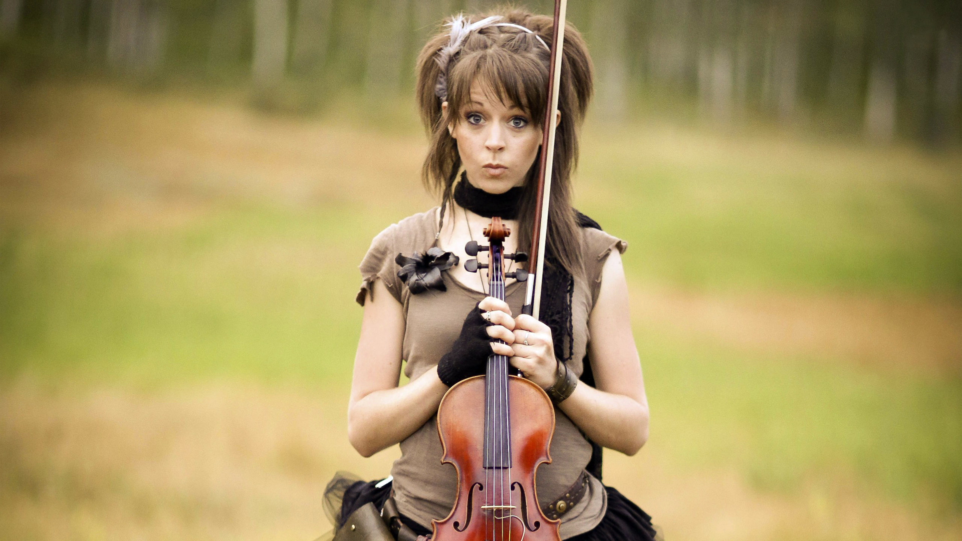 People 1920x1080 Lindsey Stirling violin women musician celebrity blurry background women outdoors looking at viewer