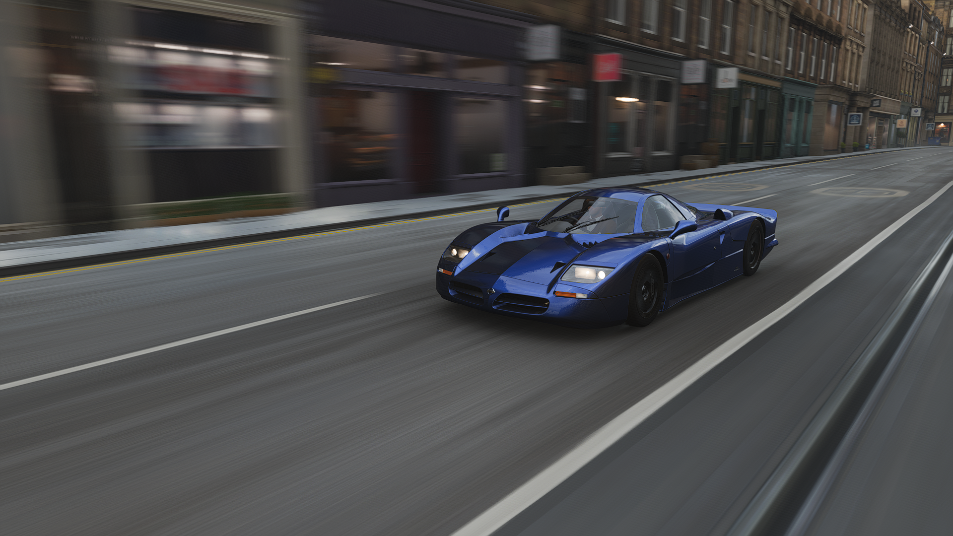 General 1920x1080 Forza Forza Horizon Forza Horizon 4 Nissan R390 GT1 racing car video games CGI road headlights blurred blurry background frontal view building driving