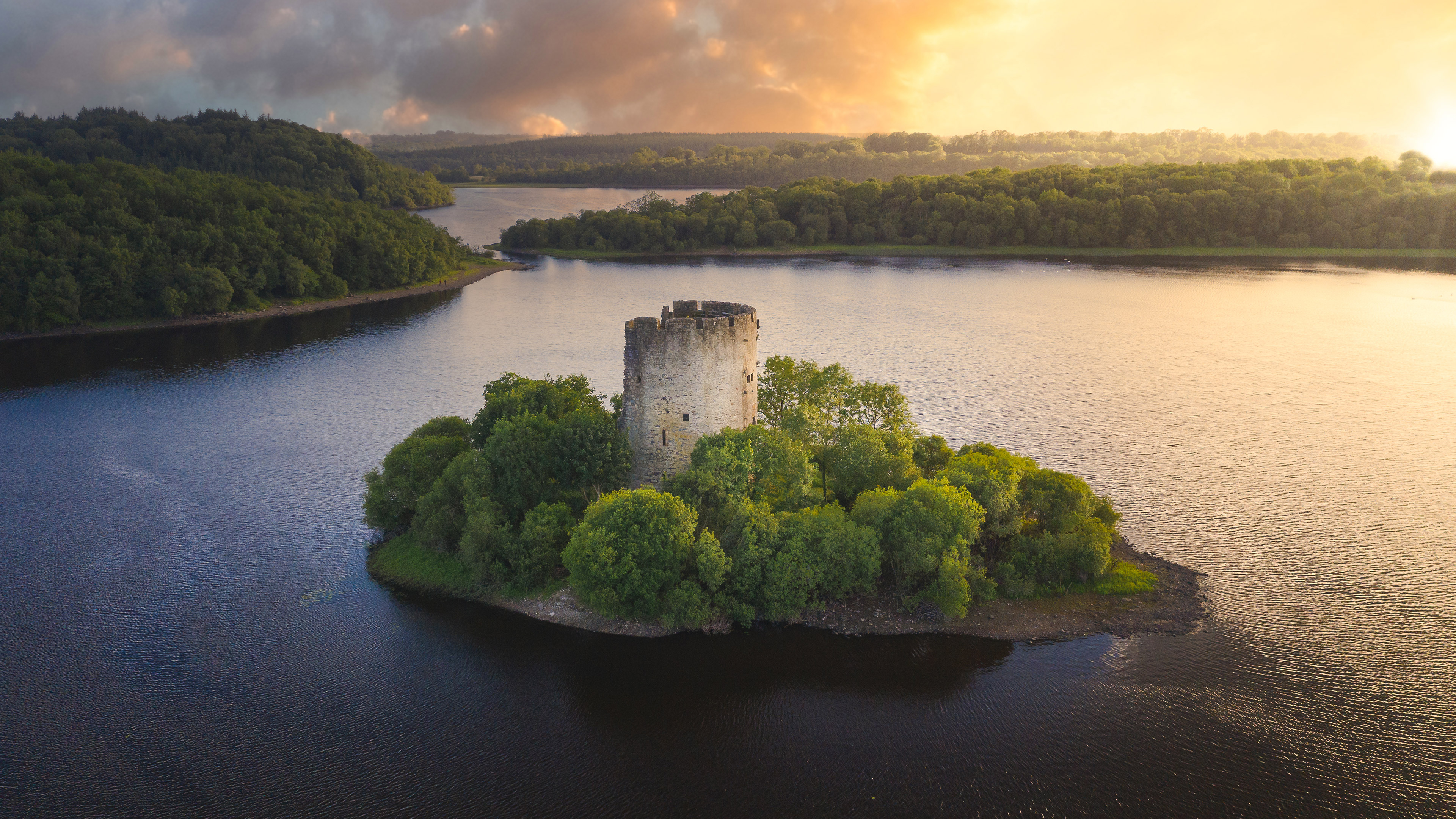 General 3840x2160 Cloughoughter Castle lake Ireland island sky nature forest water trees clouds sunset castle sunset glow