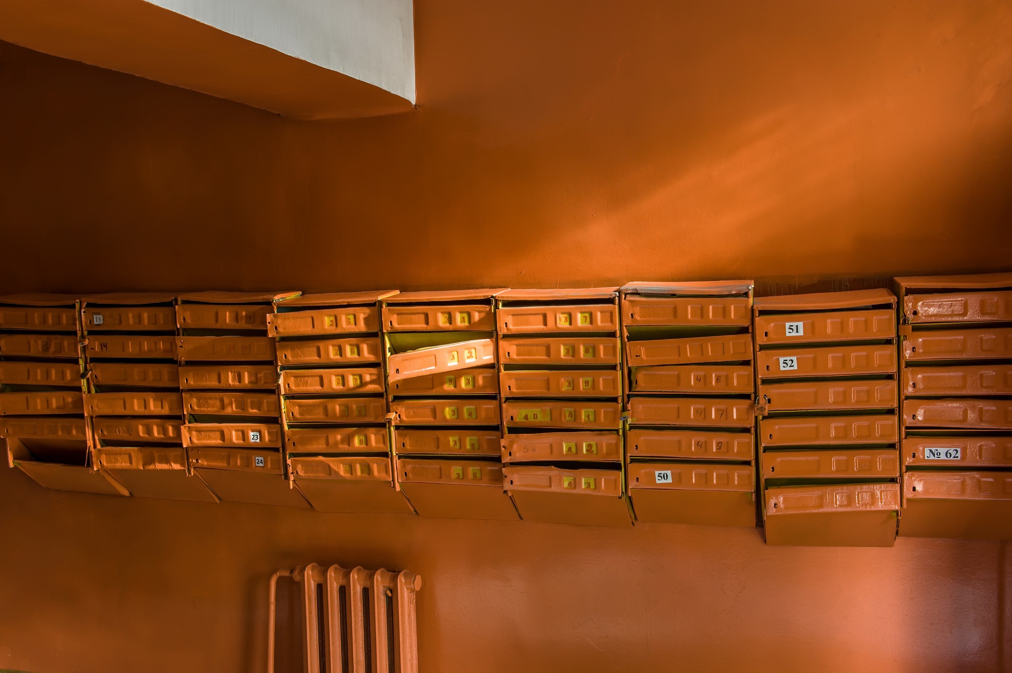General 2048x1363 mail boxes indoors metal numbers orange mailbox Russia