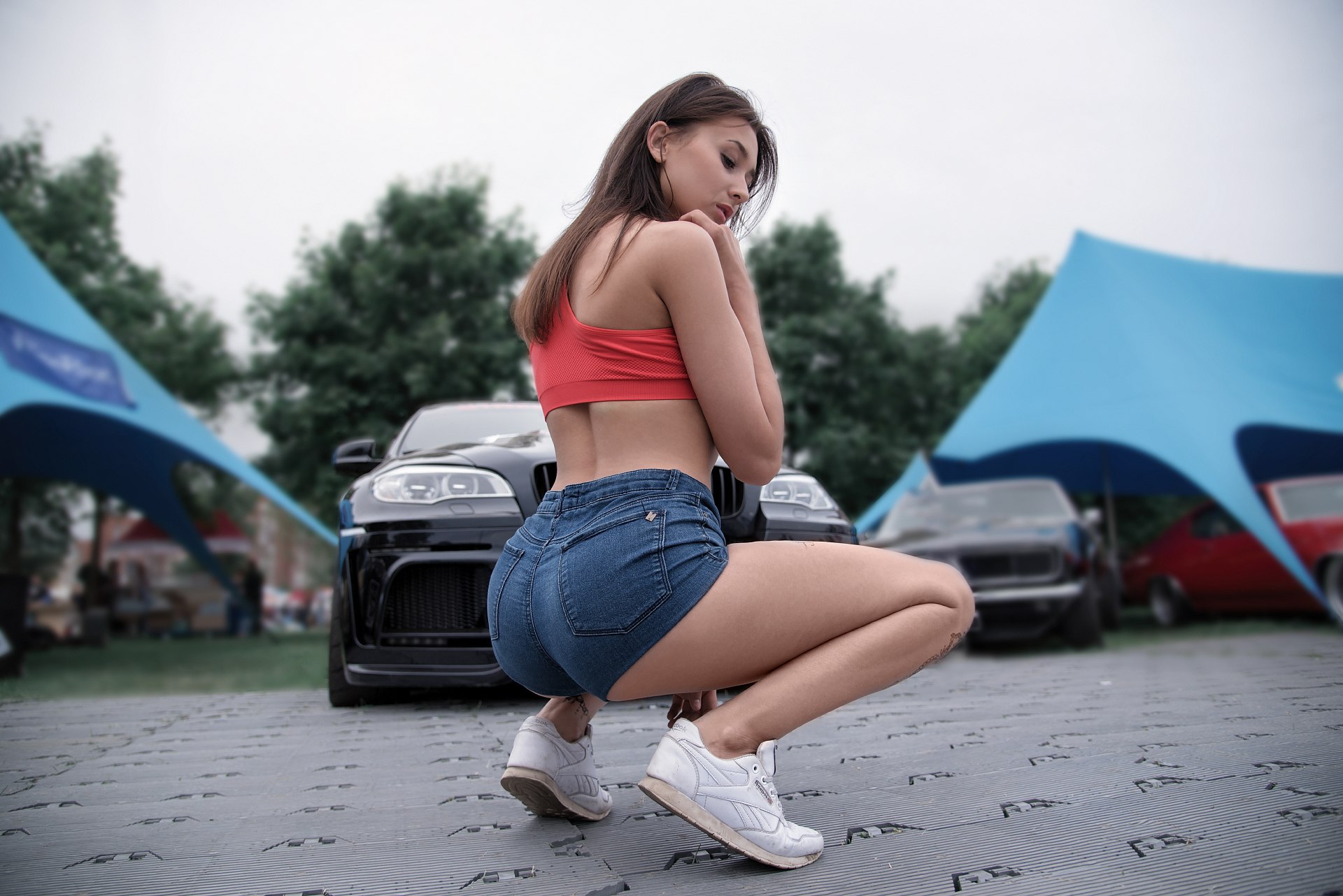 People 1920x1282 women jean shorts red tops tattoo car women outdoors ass sneakers squatting Inna Kuznetsova women with cars