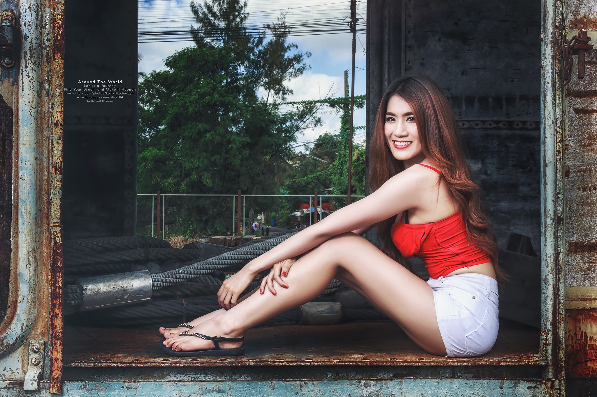 People 2048x1365 flip flops women Asian redhead sitting camisole jean shorts sandals model red tops red lipstick red nails metal rust train vehicle looking at viewer
