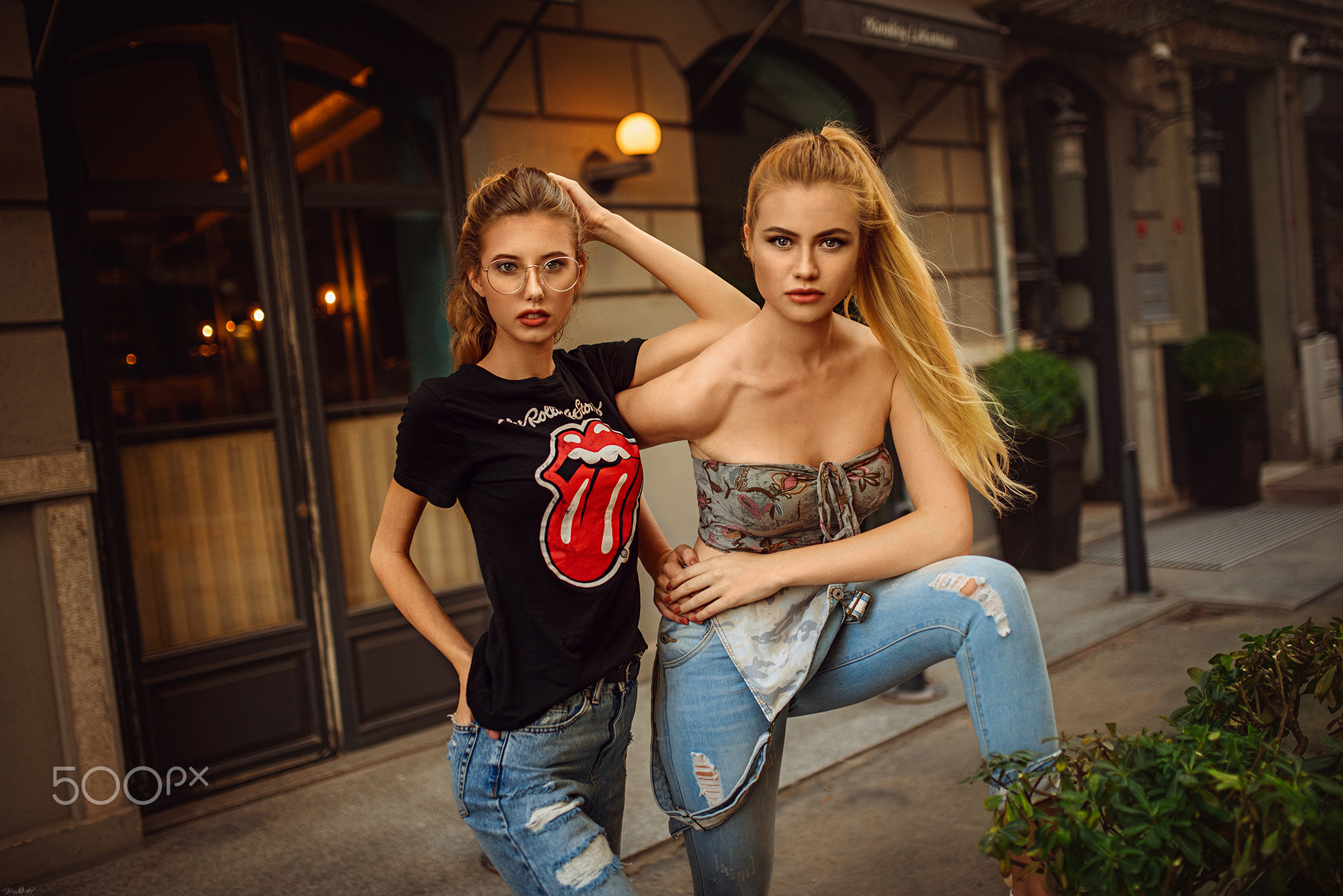 People 2048x1367 women blonde portrait overalls torn jeans T-shirt women outdoors Rolling Stones 500px watermarked rolling stones t-shirt two women model long hair urban women with glasses tube top skinny