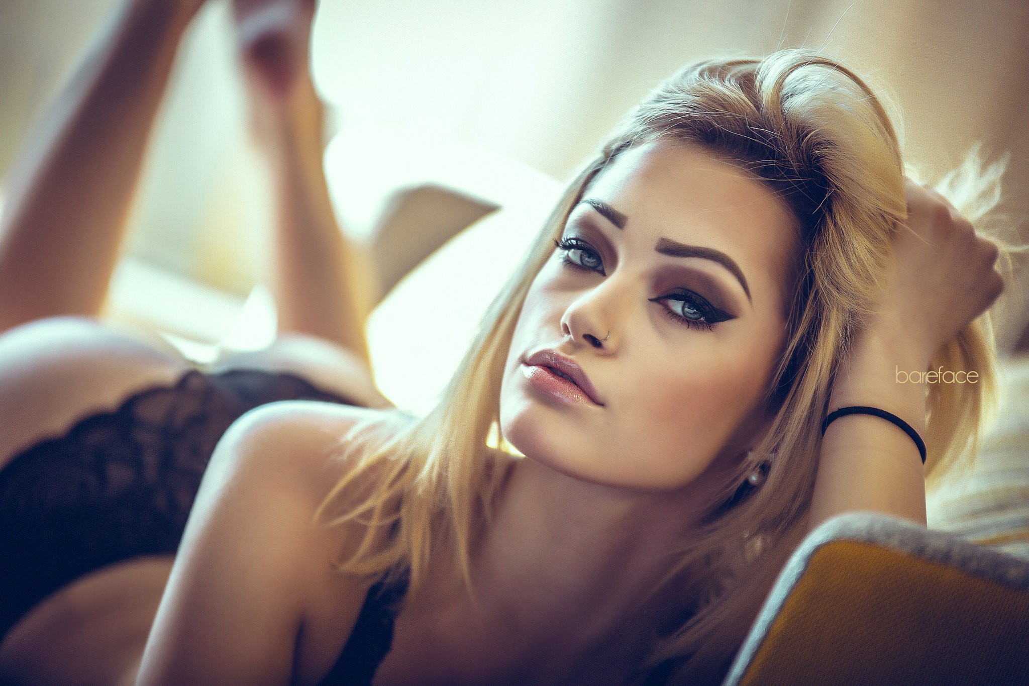 People 2048x1365 women blonde black lingerie couch makeup nose ring ass depth of field model feet in the air watermarked closeup lying down lying on front indoors women indoors looking at viewer long hair hands in hair eyelashes parted lips lingerie Bareface