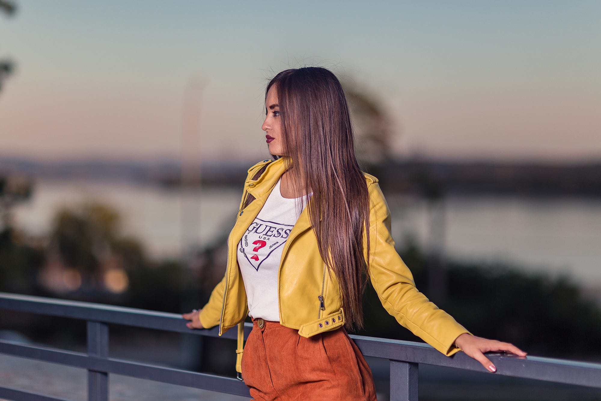People 2000x1333 women long hair women outdoors profile yellow jacket balcony white t-shirt standing looking into the distance T-shirt brown pants