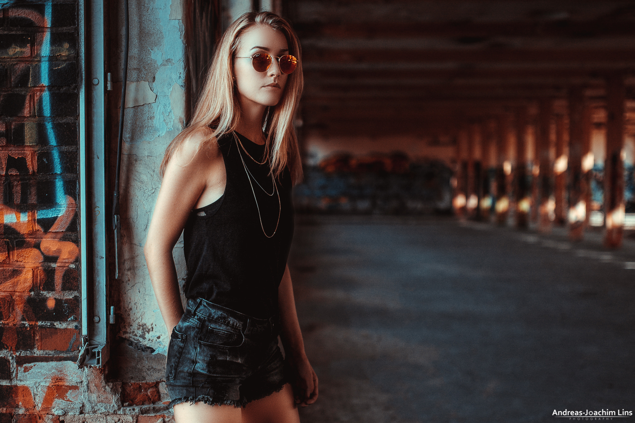 People 2048x1365 women Andreas-Joachim Lins women with glasses brunette jean shorts portrait sunglasses ruins abandoned women outdoors urban women with shades long hair black top watermarked