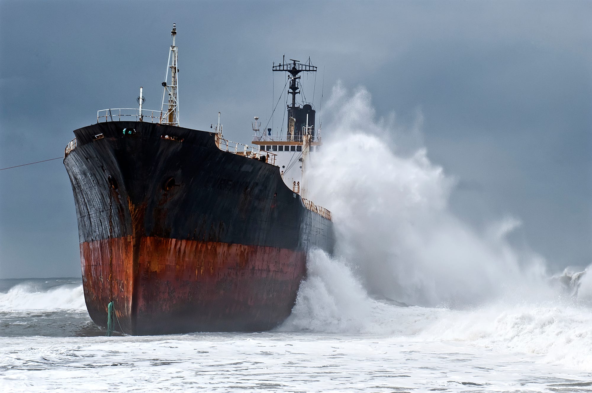 General 2000x1329 ship waves atlantic ocean rain storm splashes sea blue red gray