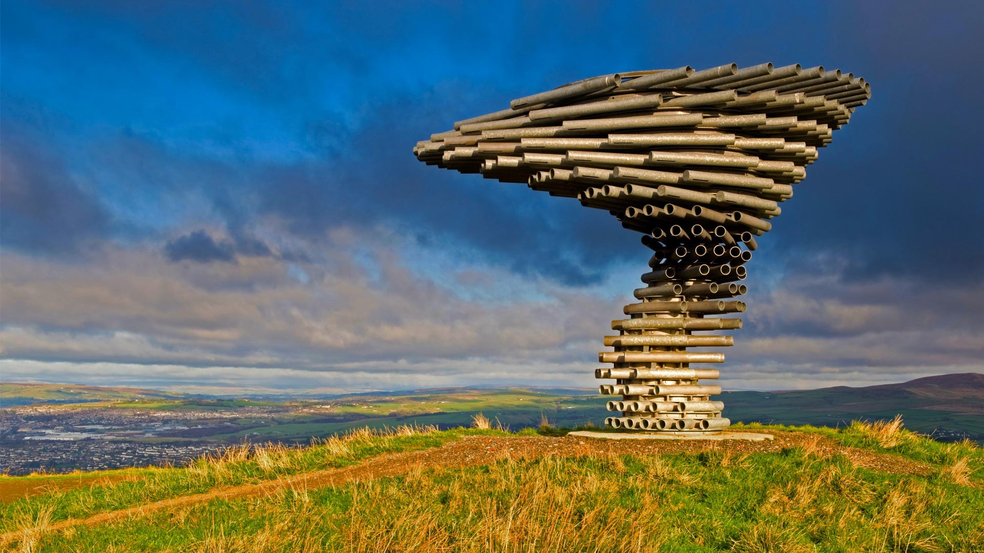 General 1920x1080 landscape clouds England UK hills sculpture pipes artwork grass town